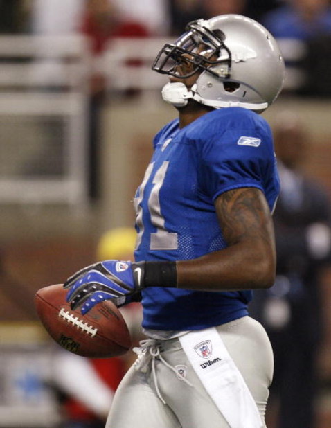 DETROIT , MI - NOVEMBER 27:  Calvin Johnson #81 of the Detroit Lions reacts after dropping a first quarter pass while playing the Tennessee Titans on November 27, 2008 at Ford Field in Detroit, Michigan.  (Photo by Gregory Shamus/Getty Images)