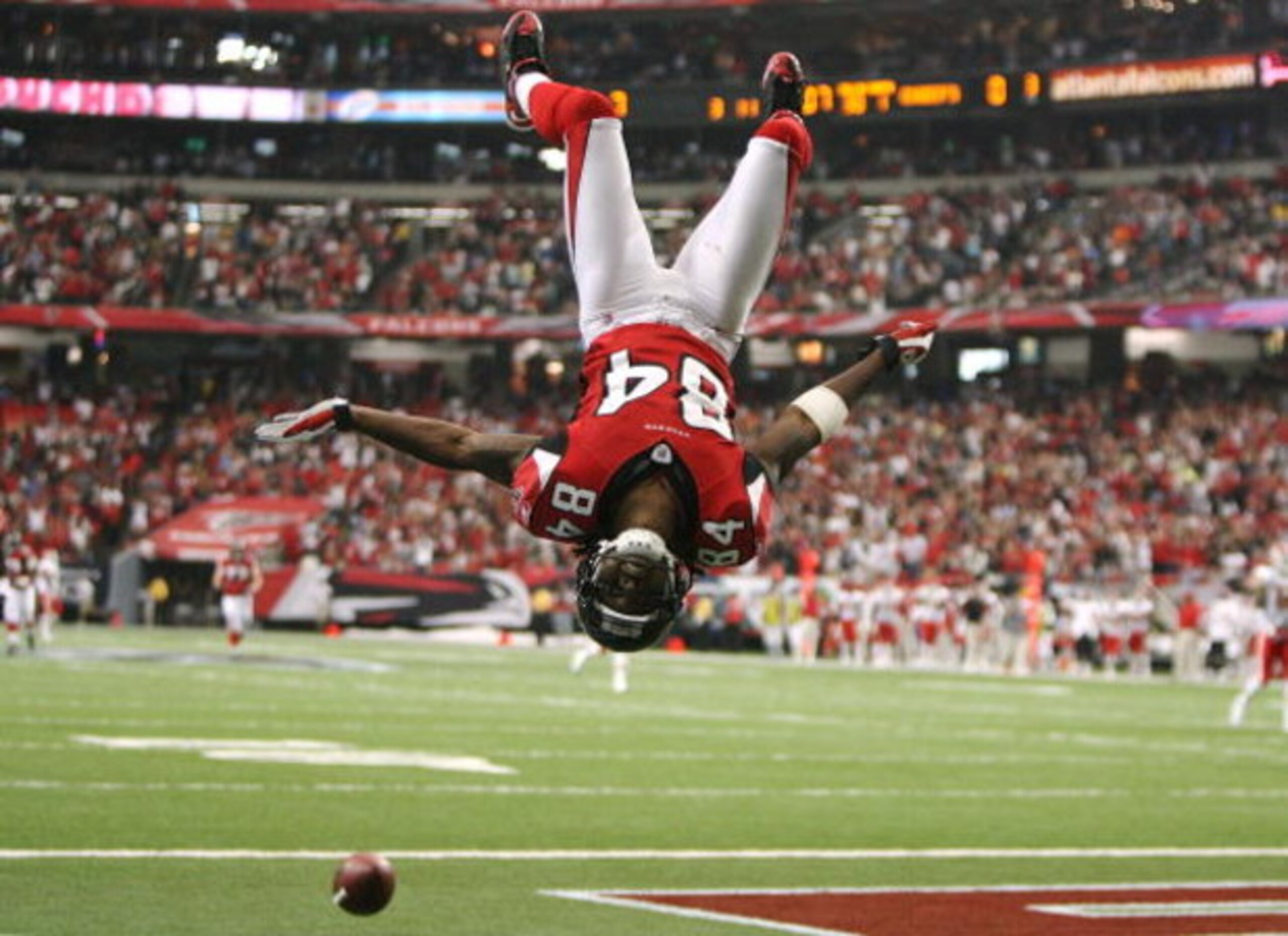 ATLANTA - SEPTEMBER 21: Wide receiver Roddy White #84 of the Atlanta Falcons does a back-flip to celebrate his touchdown in the first quarter against the Kansas City Chiefs at Georgia Dome on September 21, 2008 in Atlanta, Georgia.  (Photo by Doug Benc/Ge
