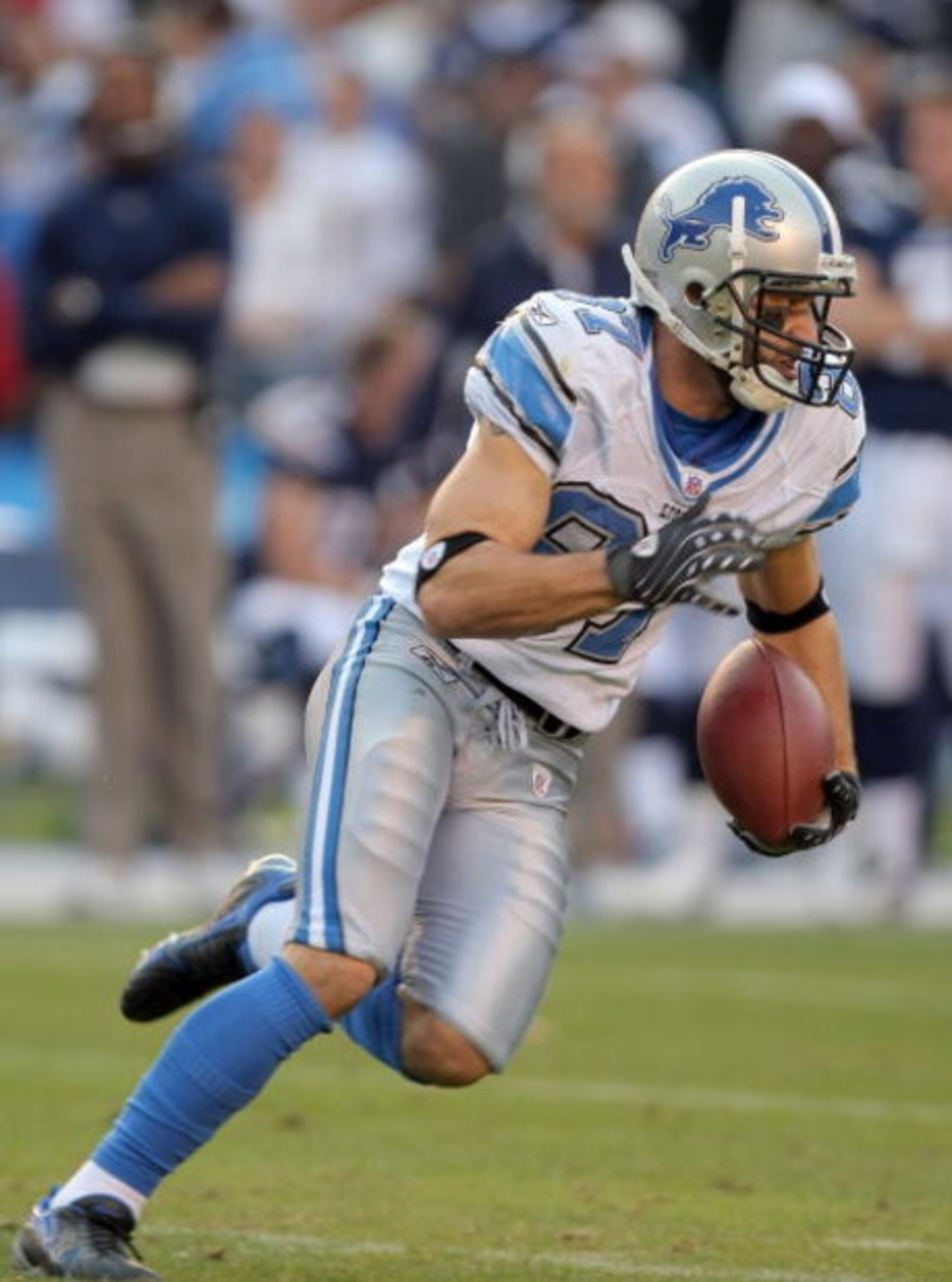 SAN DIEGO - DECEMBER 16:  Mike Furrey #87 of the Detroit Lions runs after a catch against the San Diego Chargers during the third quarter at Qualcomm Stadium December 16, 2007 in San Diego California.  (Photo by Harry How/Getty Images)