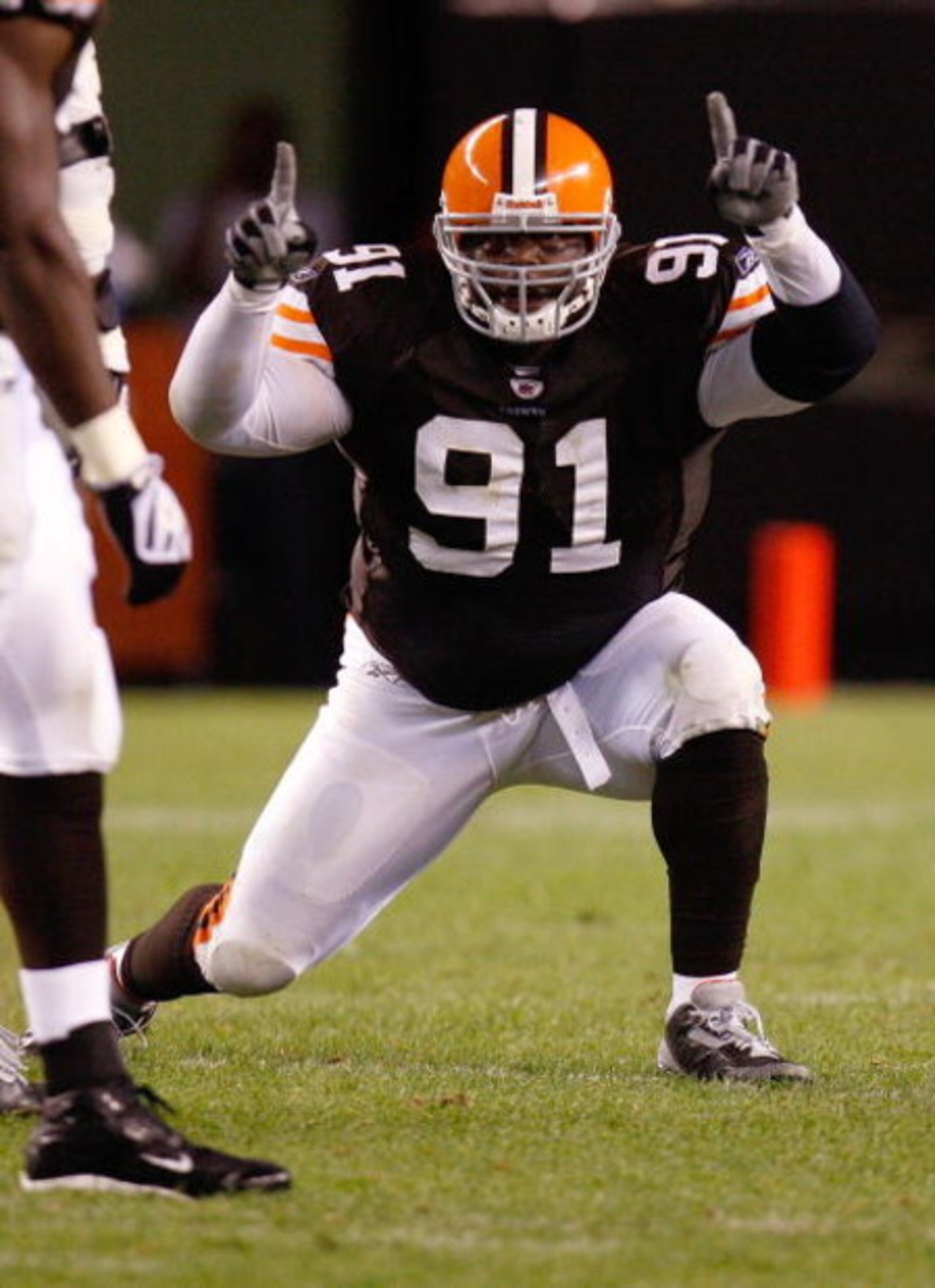 CLEVELAND, OH - SEPTEMBER 14:  Shaun Smith #91 of the Cleveland Browns celebrates after a play during the game against the Pittsburgh Steelers on September 14, 2008 at Cleveland Browns Stadium in Cleveland, Ohio. The Steelers defeated the Browns 10-6. (Ph