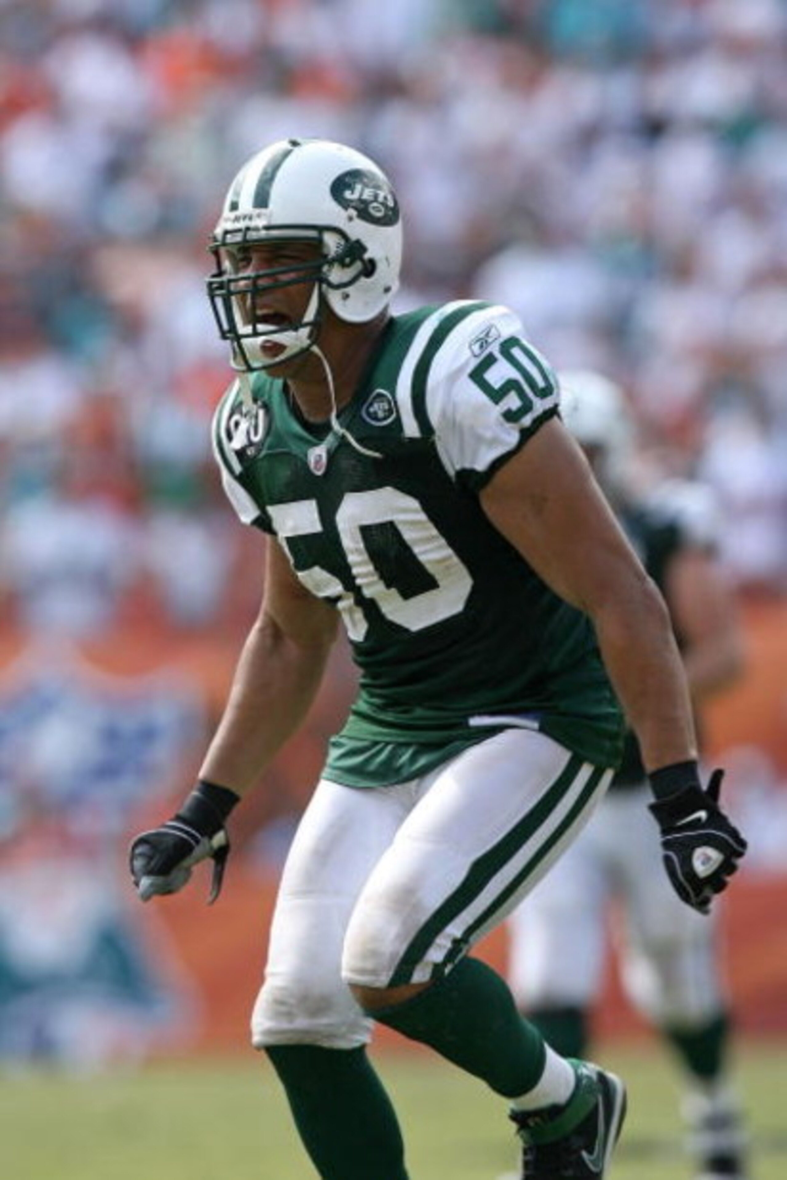 MIAMI - SEPTEMBER 07:  Eric Barton #50 of the New York Jets reacts against the Miami Dolphins at Dolphin Stadium on September 7, 2008 in Miami, Florida. The Jets won 20-14.  (Photo by Doug Benc/Getty Images)