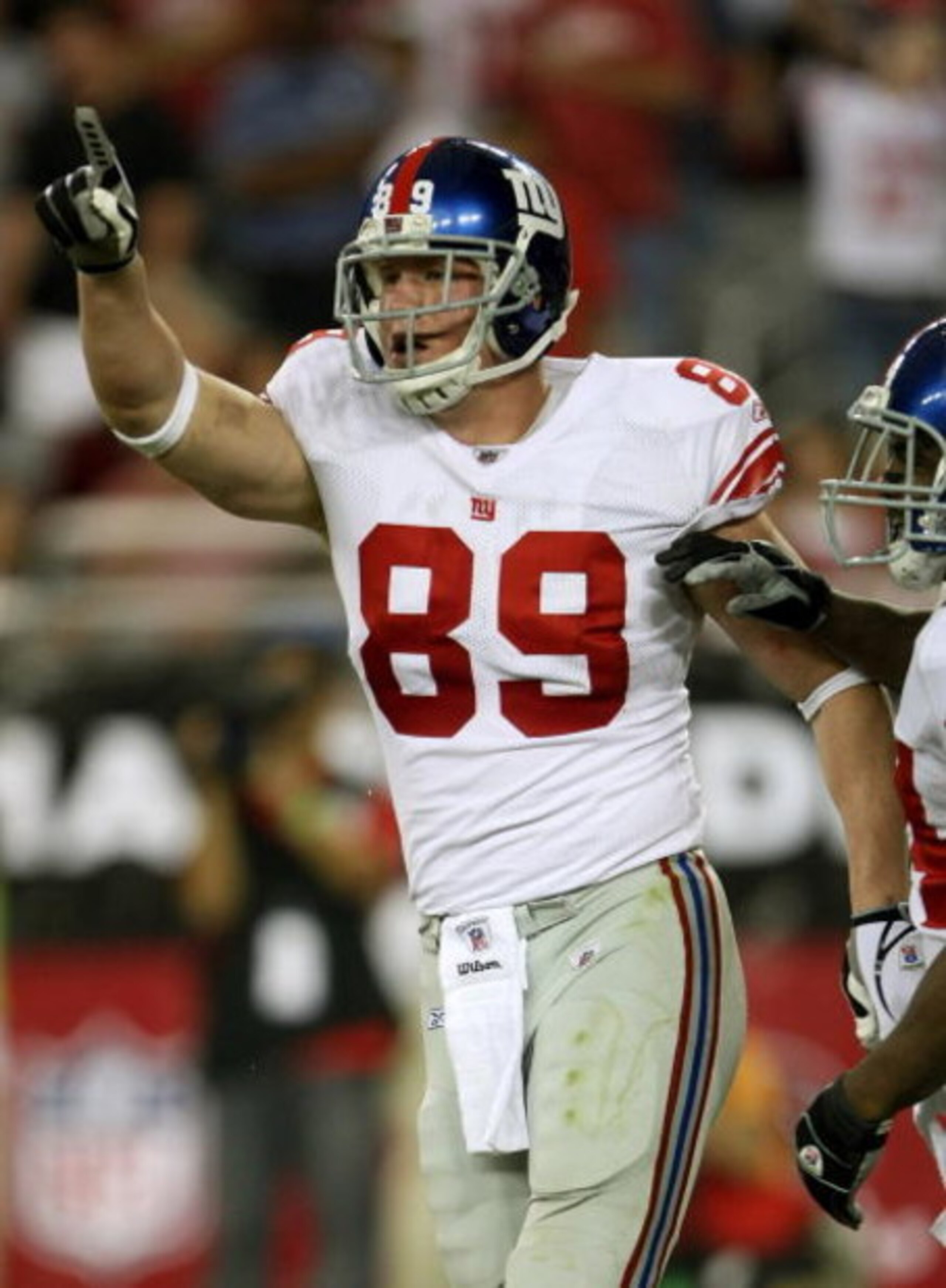 GLENDALE, AZ - NOVEMBER 23: Tight end Kevin Boss #89 of the New York Giants celebrates after scoring on a ten yard touchdown pass play against the Arizona Cardinals on November 23, 2008 at University of Phoenix Stadium in Glendale, Arizona. The Giants won