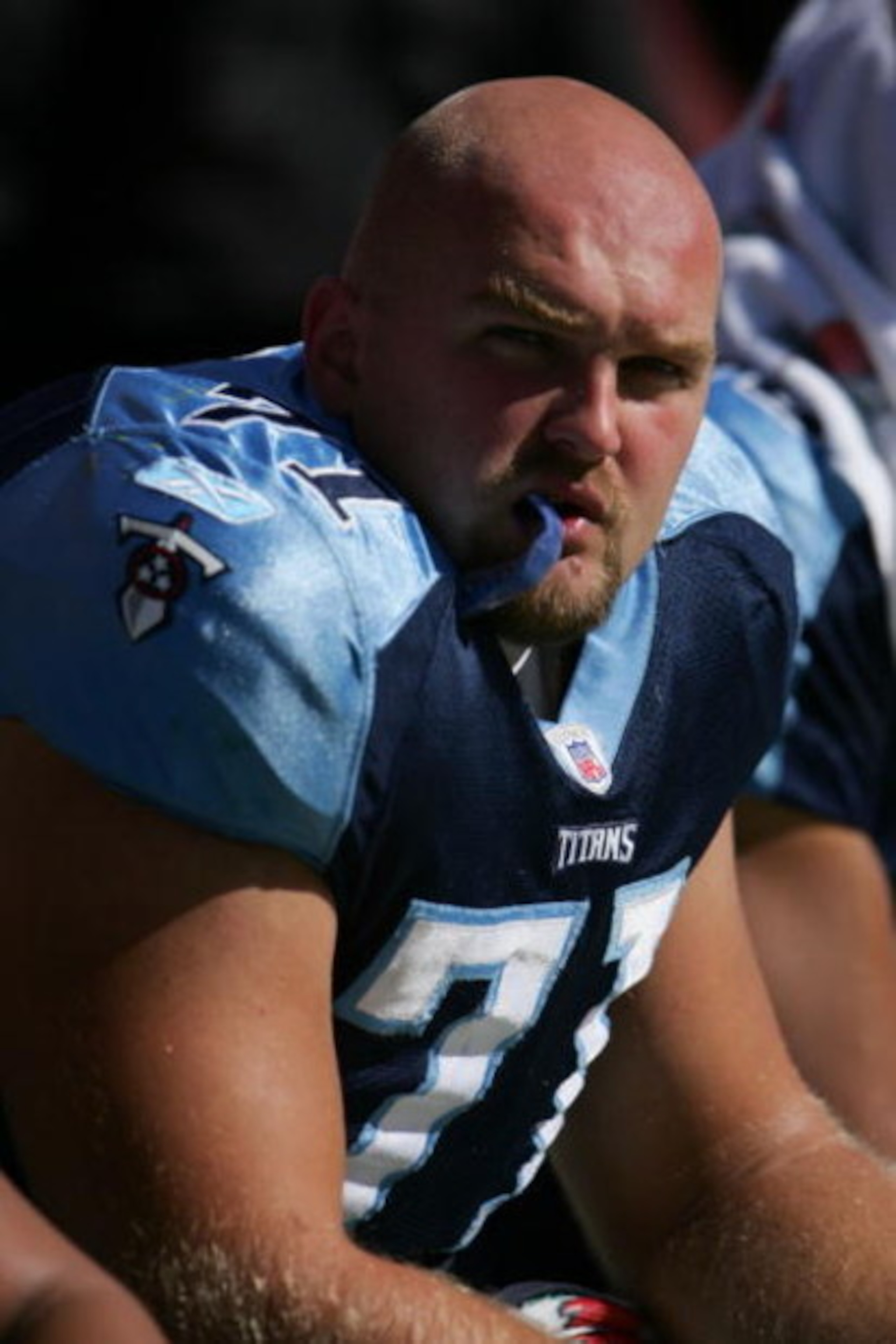 WASHINGTON ? OCTOBER 15:  Tackle Michael Roos #71 of the Tennessee Titans watches the game against the Washington Redskins on October 15, 2006 at FedExField in Landover, Maryland. The Titans won 25-22.  (Photo by Chris McGrath/Getty Images) 