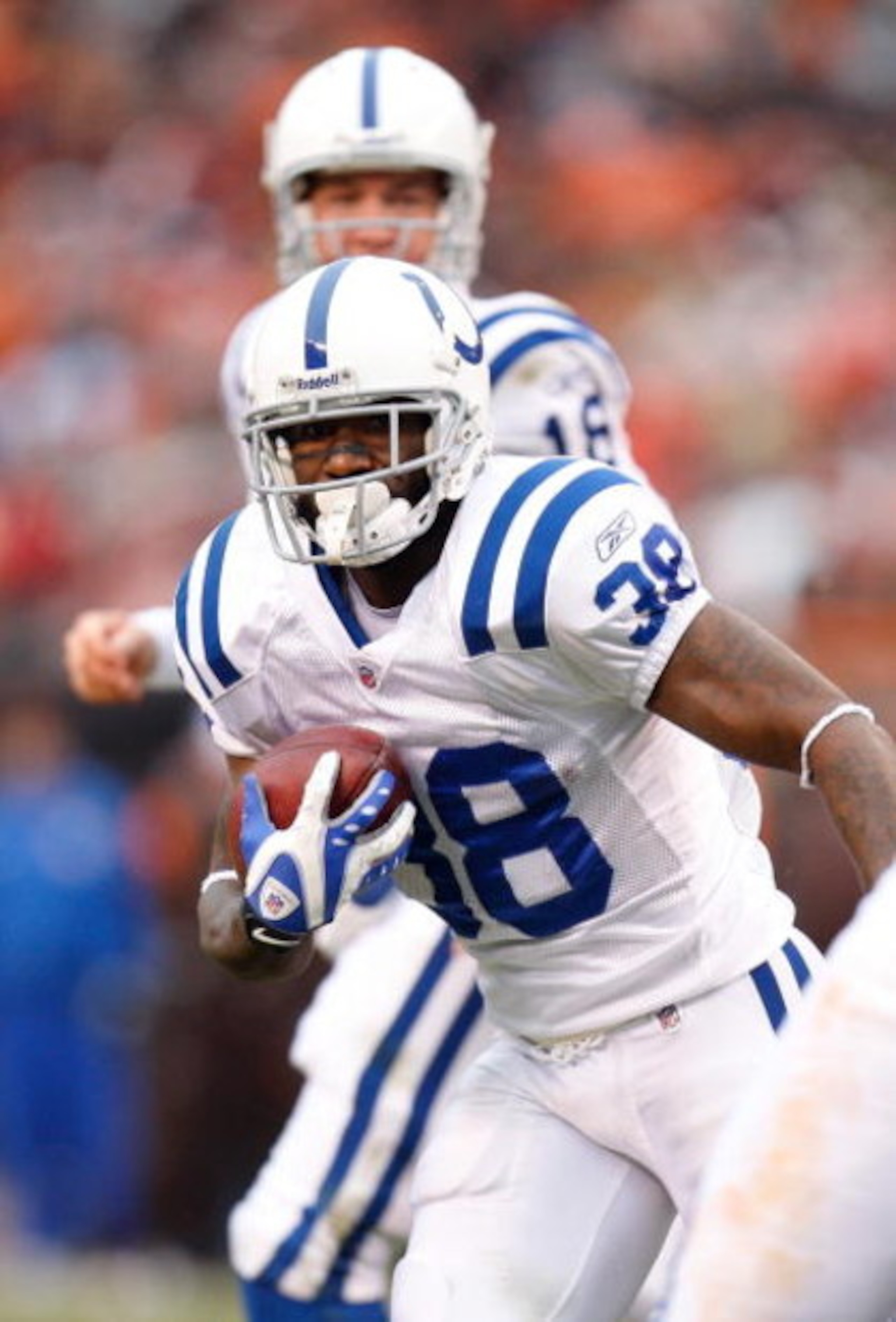 CLEVELAND - NOVEMBER 30:  Dominic Rhodes #38 of the Indianapolis Colts runs with the ball during their NFL game against the Cleveland Browns on November 30, 2008 at Cleveland Browns Stadium in Cleveland, Ohio. The Colts defeated the Browns 10-6.  (Photo b