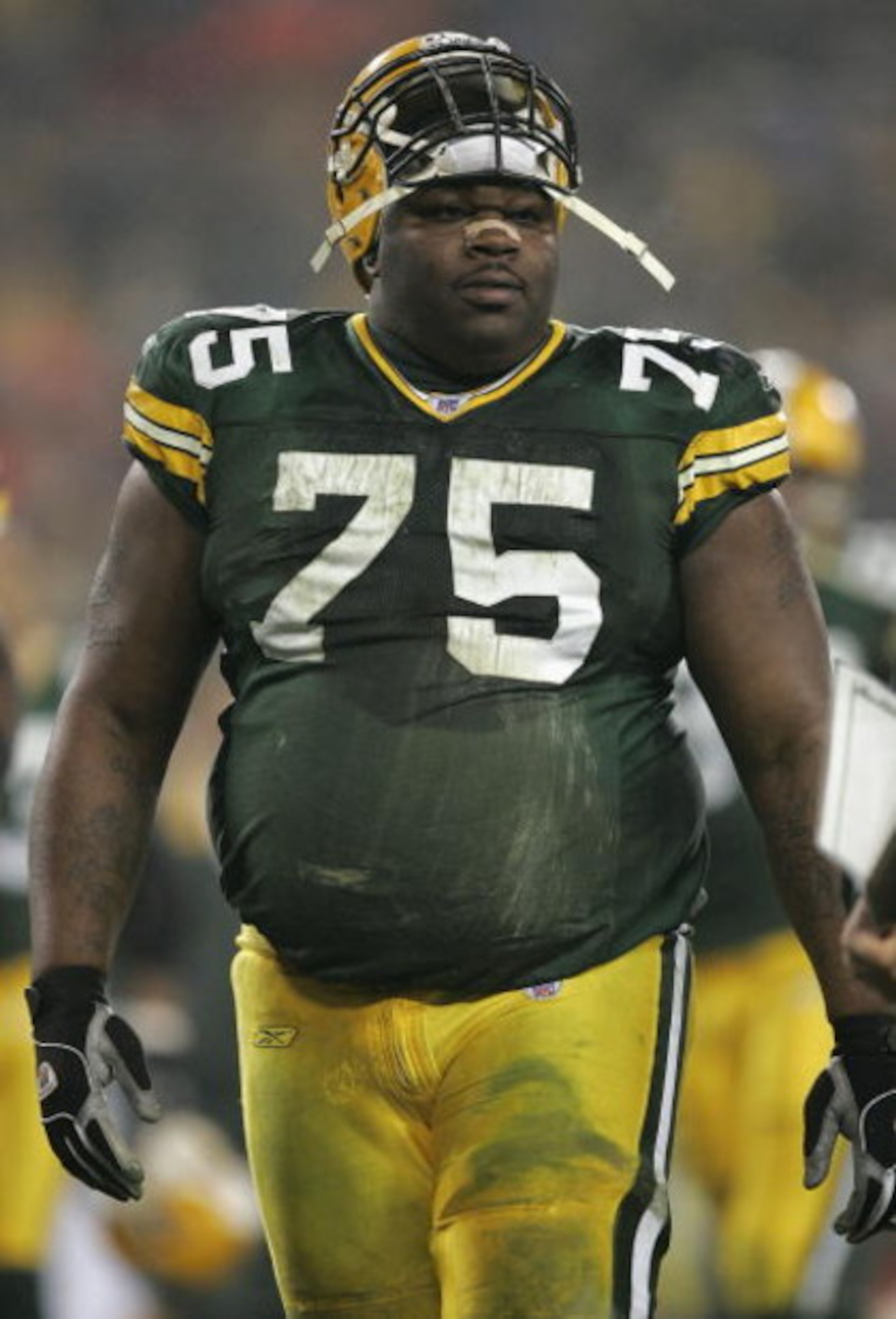 GREEN BAY, WI - JANUARY 9:  Defensive tackle Grady Jackson #75 of the Green Bay Packers leaves the field during half-time against the Minnesota Vikings in the NFC wild-card game at Lambeau Field on January 9, 2005 in Green Bay, Wisconsin.  The Vikings def