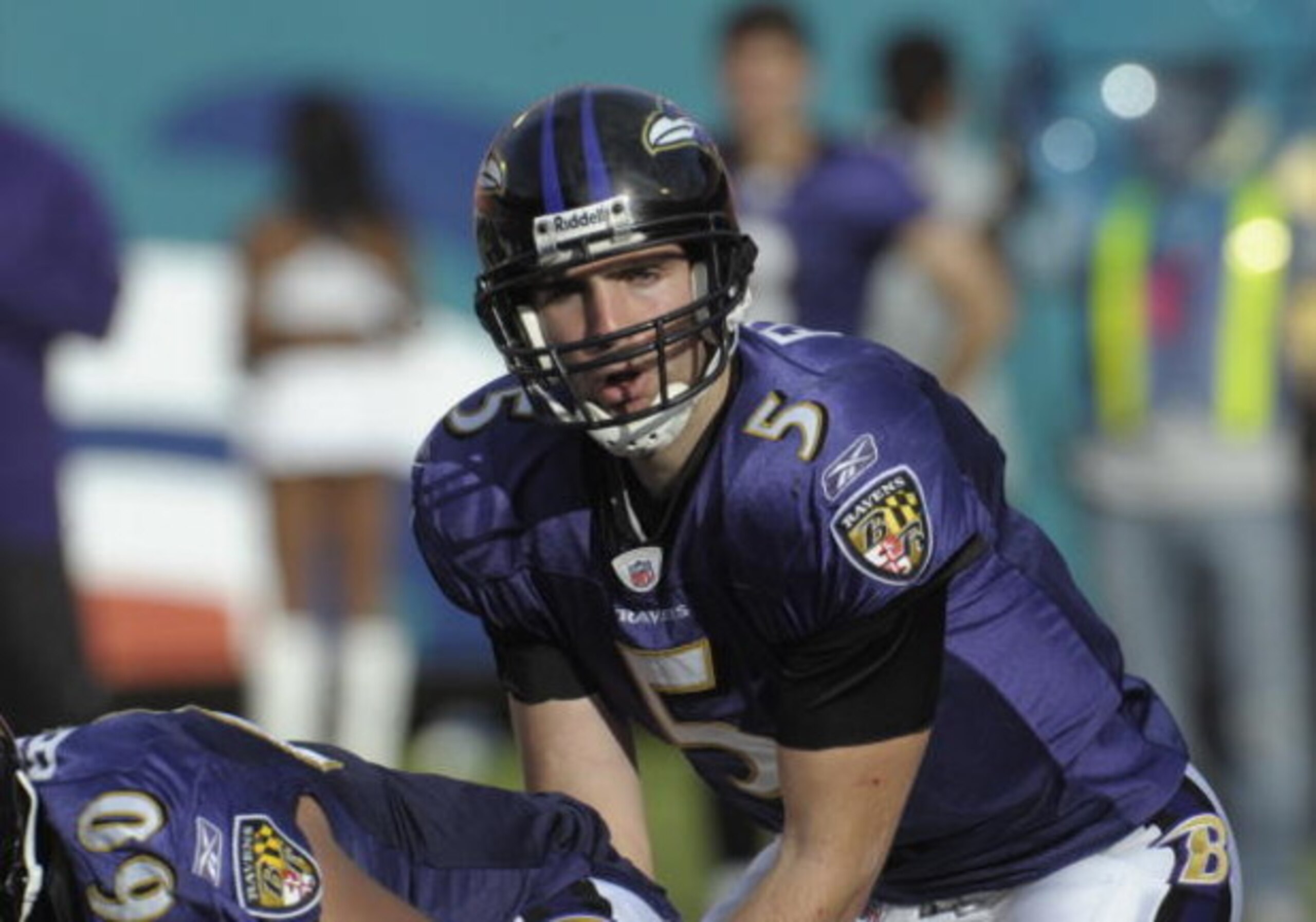 MIAMI, FL - JANUARY 4:  Quarterback Joe Flacco #5 of the Baltimore Ravens directs play against the Miami Dolphins in an NFL Wildcard Playoff Game at Dolphins Stadium on January 4, 2009 in Miami, Florida.  (Photo by Al Messerschmidt/Getty Images) 