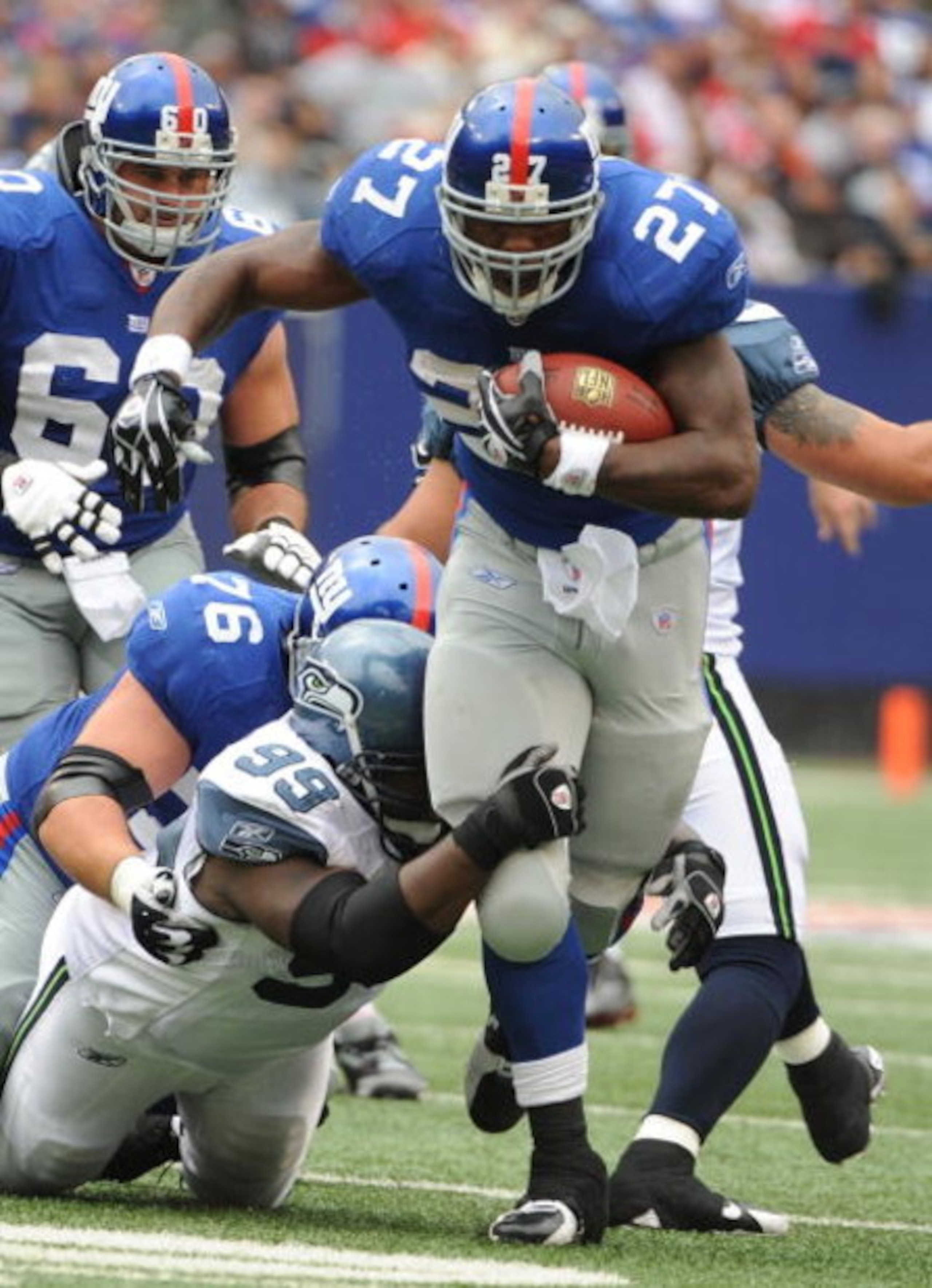EAST RUTHERFORD, NJ - OCTOBER 05:  Brandon Jacobs #27 of the New York Giants runs against the Seattle Seahawks during their game on October 5, 2008 at Giants Stadium in East Rutherford, New Jersey.  (Photo by Al Bello/Getty Images)