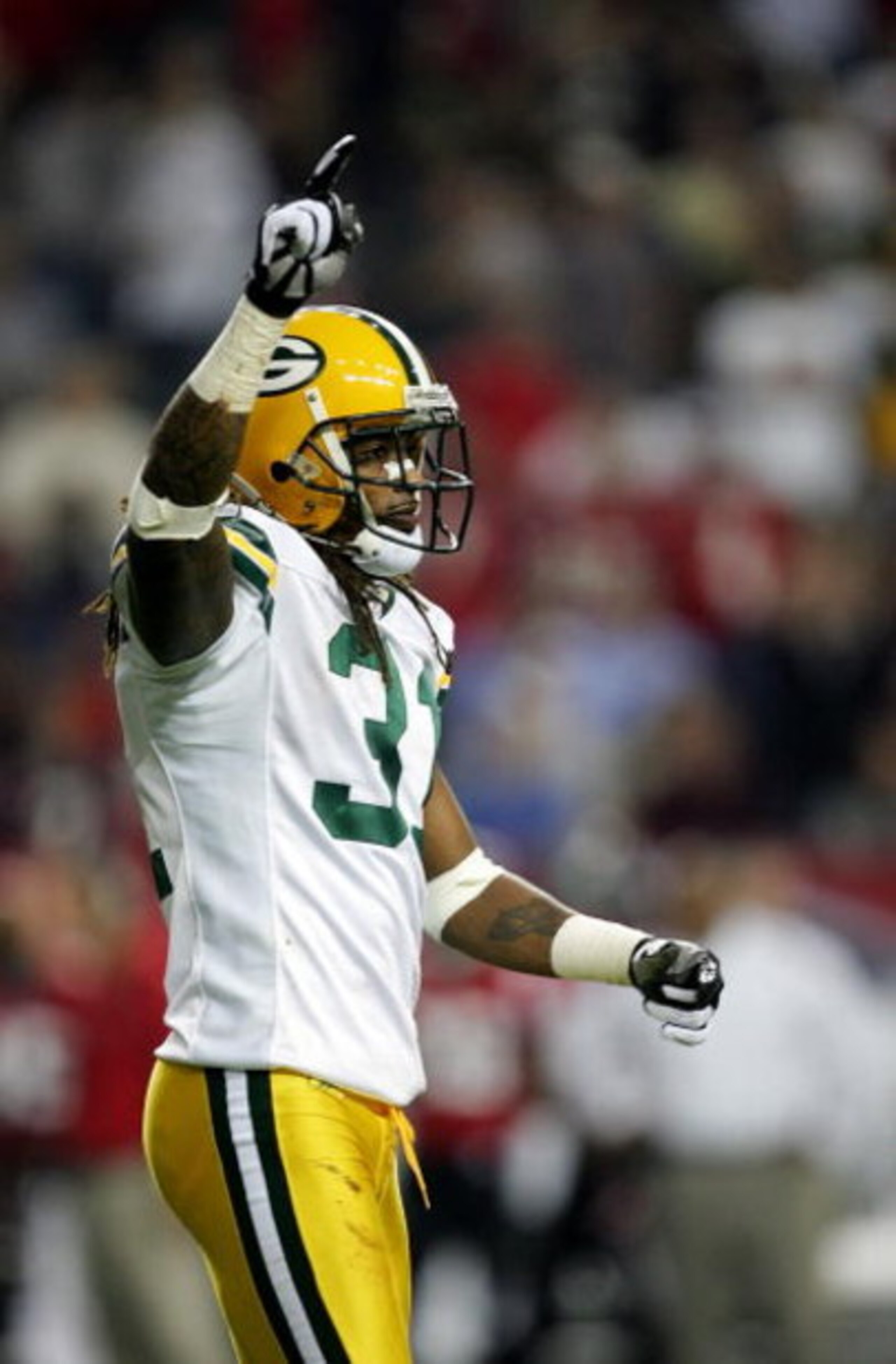 ATLANTA - NOVEMBER 13:  Al Harris #31 of the Green Bay Packers celebrates after defeating the Atlanta Falcons 33-25 during their game on November 13, 2005 at the Georgia Dome in Atlanta, Georgia.  (Photo by Streeter Lecka/Getty Images)