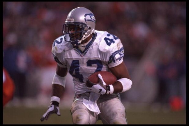 10 Dec 1995:  Running back Chris Warren #42 of the Seattle Seahawks carries his ball into the defense of the Denver Broncos at Mile High Stadium in Denver, Colorado. The Seahawks defeated the Broncos 31-27. Mandatory Credit:  Al Bello/Allsport