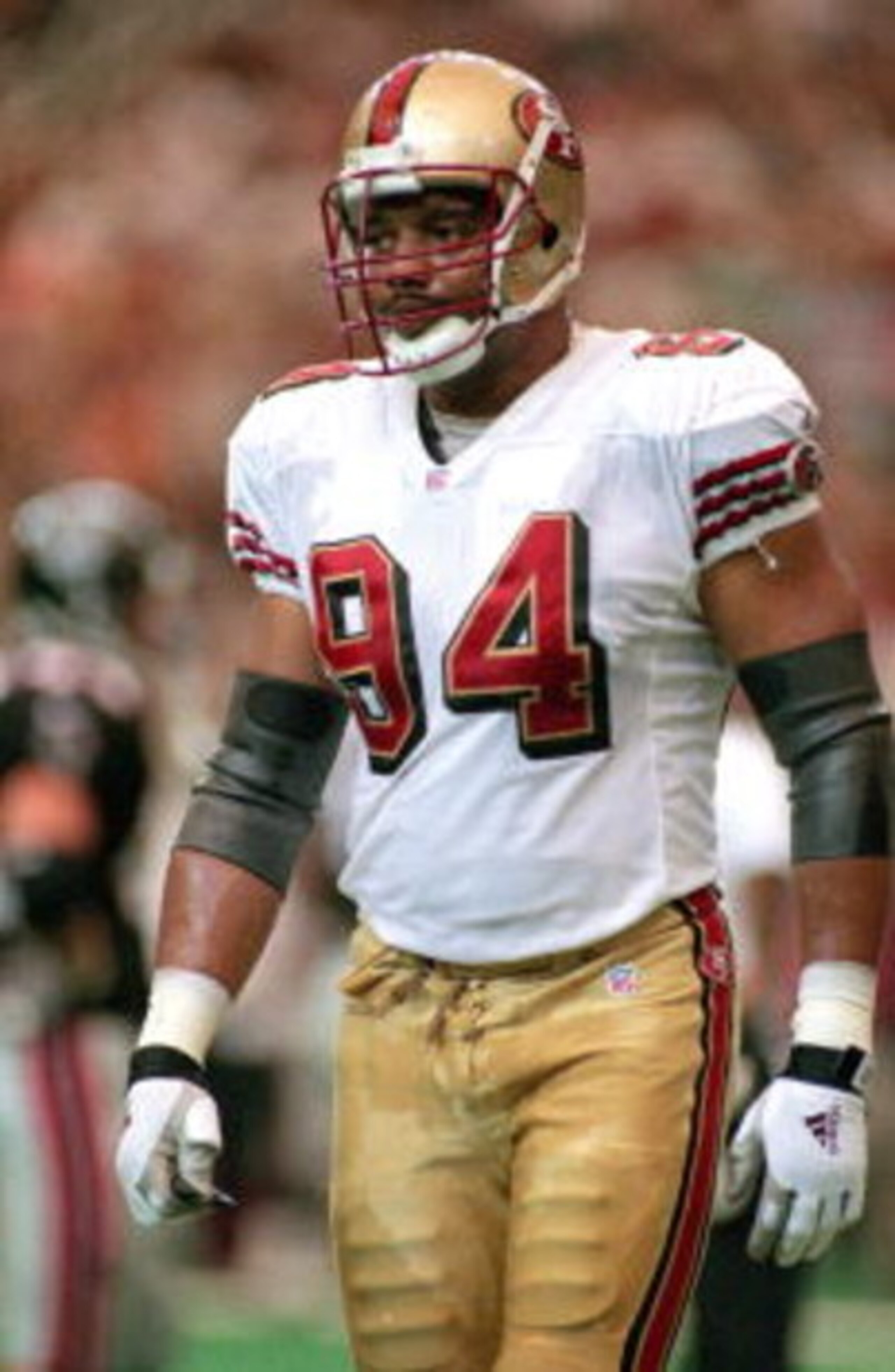 3 Sep 2000:  Anthony Pleasant #94 of the San Francisco 49ers walks out to the field during the game against the Atlanta Falcons at the Georgia Dome in Atlanta, Georgia. The Falcons defeated the 49ers 36-28.Mandatory Credit: Scott Halleran  /Allsport
