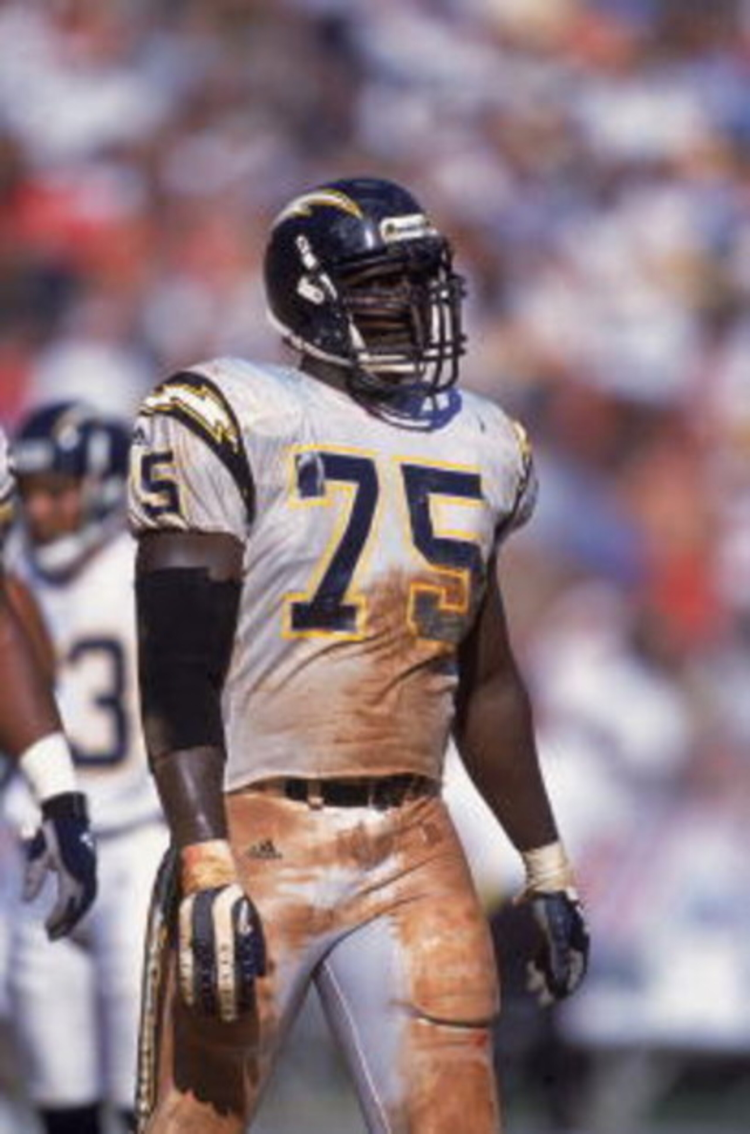30 Sep 2001:  Marcellus Wiley #75 of the San Diego Chargers walks out on the field during the game against the Cincinnati Bengals at the Qualcomm Stadium in San Diego, California.  The Chargers defeated the Bengals 28-14.Mandatory Credit: Scott Halleran  