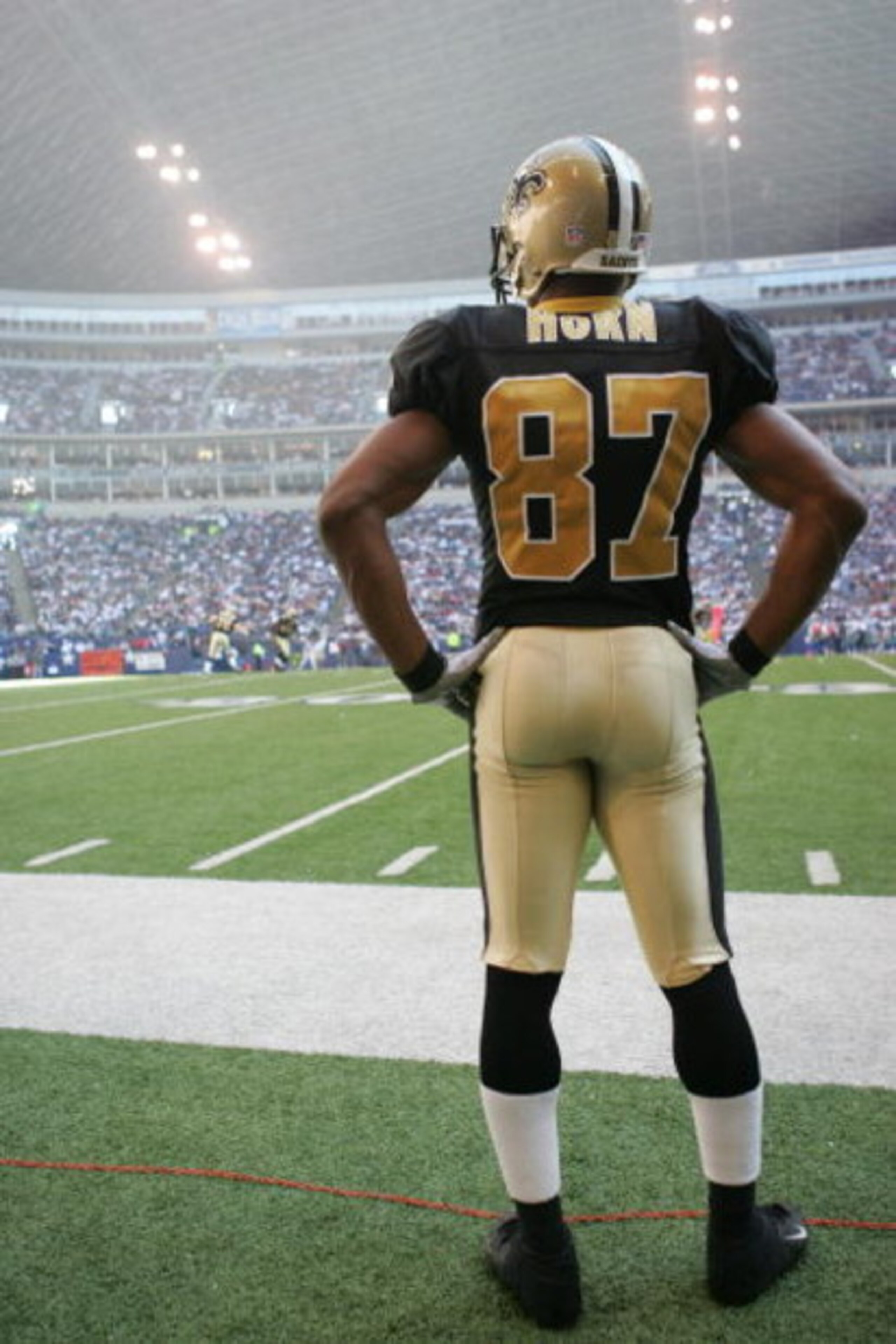 IRVING, TX - DECEMBER 12:  Wide receiver Joe Horn #87 of the New Orleans Saints watches the game against the Dallas Cowboys on December 12, 2004 at Texas Stadium in Irving, Texas.  The Saints defeated the Cowboys 27-13.  (Photo by Ronald Martinez/Getty Im