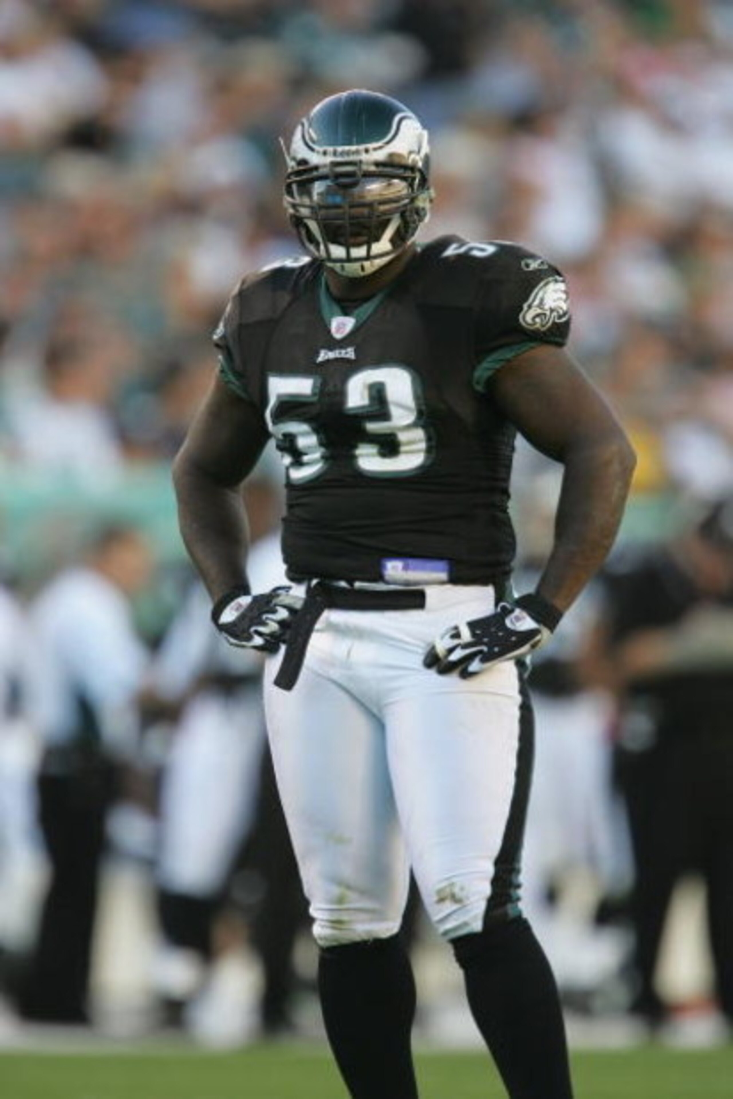 PHILADELPHIA - OCTOBER 31:  Defensive end Hugh Douglas #53 of the Philadelphia Eagles stands on the field during the game against the Baltimore Ravens at Lincoln Financial Field on October 31, 2004 in Philadelphia, Pennsylvania. The Eagles defeated the Ra