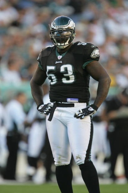 PHILADELPHIA - OCTOBER 31:  Defensive end Hugh Douglas #53 of the Philadelphia Eagles stands on the field during the game against the Baltimore Ravens at Lincoln Financial Field on October 31, 2004 in Philadelphia, Pennsylvania. The Eagles defeated the Ra