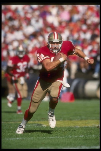 24 Oct 1993:  Tight end Brent Jones of the San Francisco 49ers runs with the ball during a game against the Phoenix Cardinals at Candlestick Park in San Francisco, California. The 49ers won the game, 28-14. Mandatory Credit: Otto Greule  /Allsport
