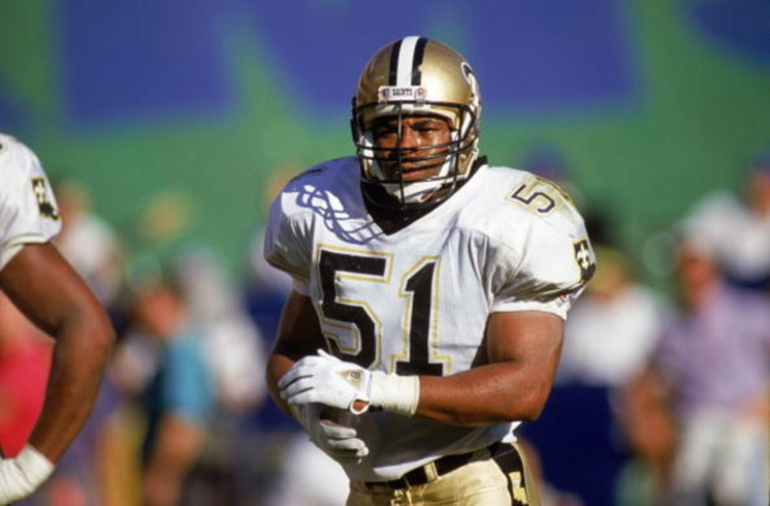 ANAHEIM, CA - DECEMBER 9:  Linebacker Sam Mills #51 of the New Orleans Saints stands on the field during an NFL game on December 9, 1990 against the Los Angeles Rams at Anaheim Stadium in Anaheim, California. The Saints defeated the Rams 24-21. (Photo by 