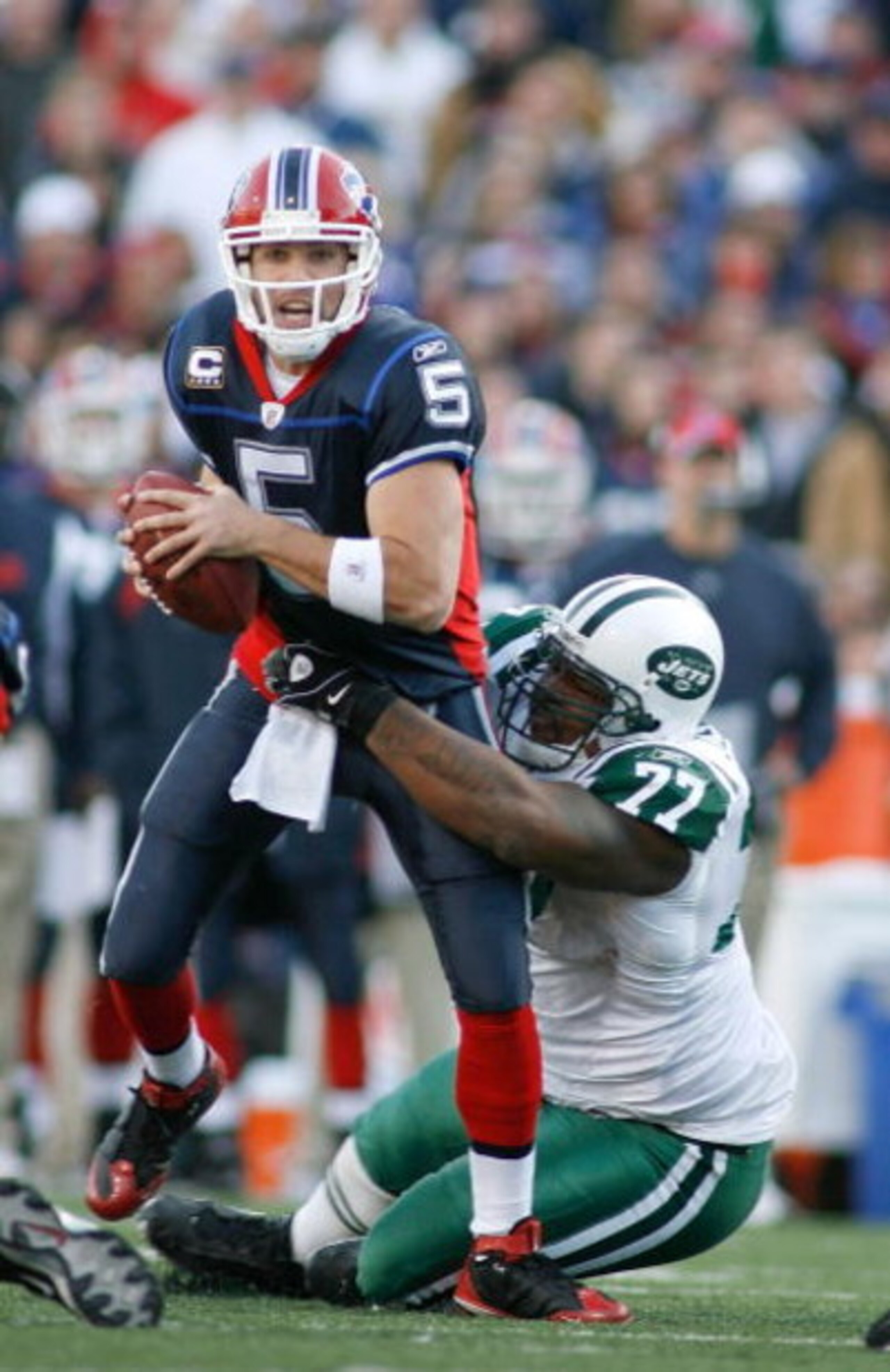 ORCHARD PARK, NY - NOVEMBER 02: Kris Jenkins #77 of the New York Jets sacks Trent Edwards #5 of the Buffalo Bills   on November 2, 2008 at Ralph Wilson Stadium in Orchard Park, New York. New York won 26-17. (Photo by Rick Stewart/Getty Images)