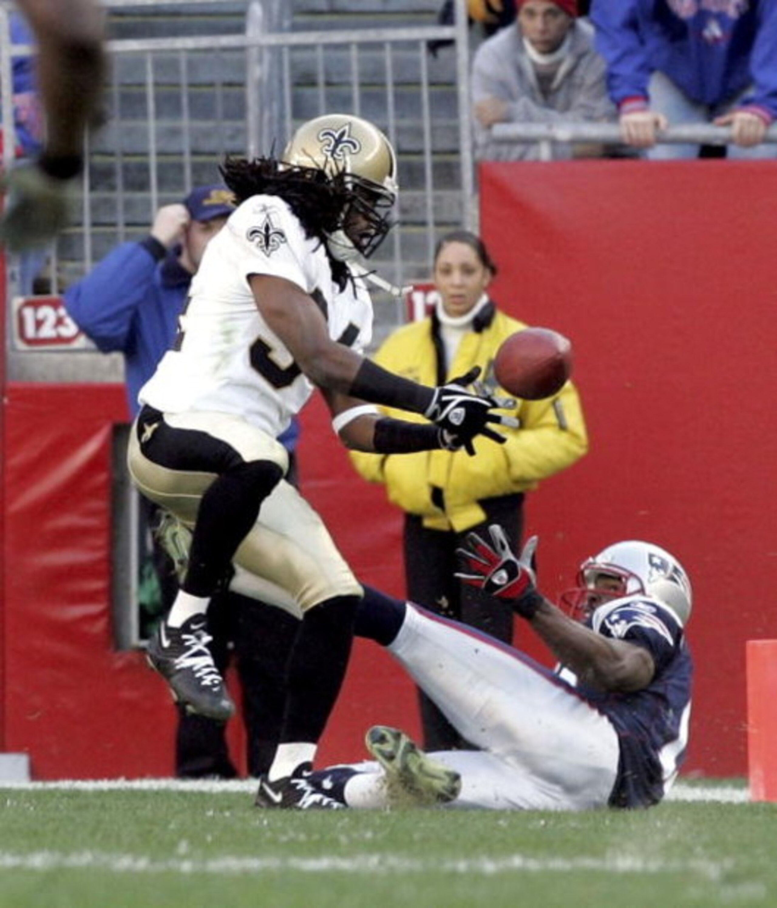 FOXBORO, MA - NOVEMBER 20:  Cornerback Mike McKenzie #34 of the New Orleans Saints breaks up a pass intended for wide receiver Andre Davis #18 of the New England Patriots on November 20, 2005 at Gillette Stadium in Foxboro, Massachusetts. The Patriots def