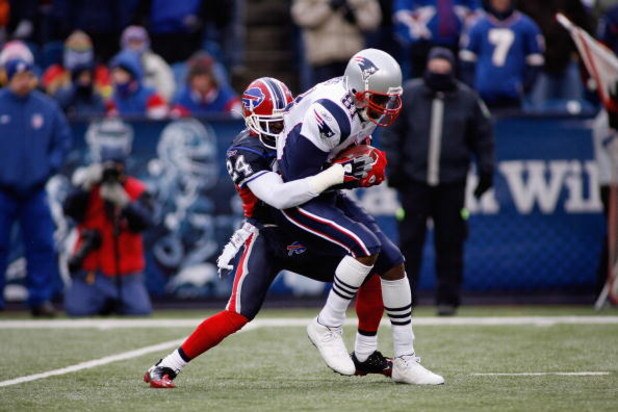 ORCHARD PARK, NY - DECEMBER 28:  Terrence McGee #24 of the Buffalo Bills tackles Randy Moss #81 of the New England Patriots on December 28, 2008 at Ralph Wilson Stadium in Orchard Park, New York. (Photo by Rick Stewart/Getty Images)