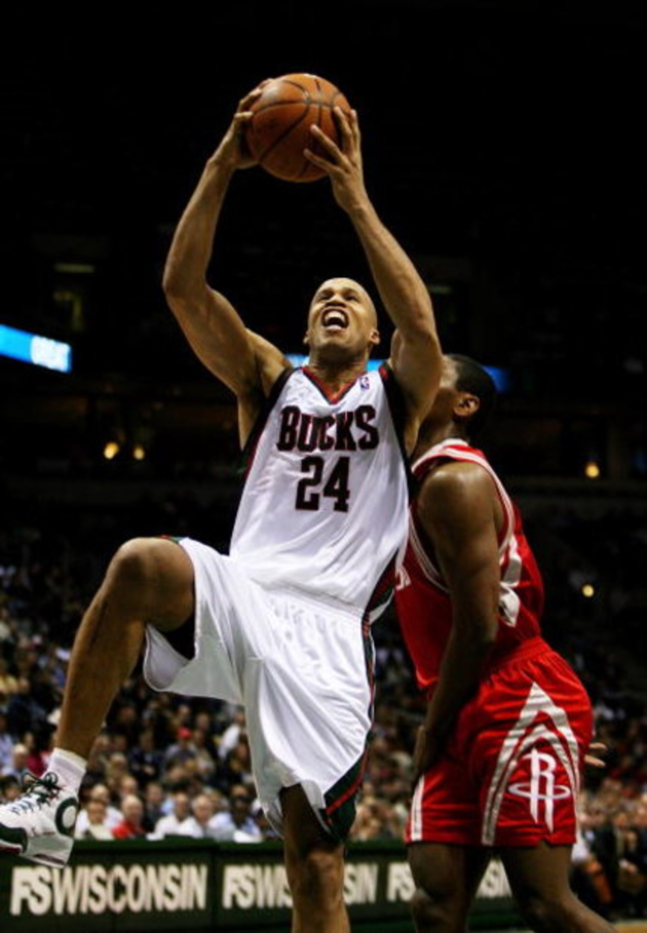 MILWAUKEE - FEBRUARY 09: Richard Jefferson #24 of the Milwaukee Bucks drives to the basket past Ron Artest #96 of the Houston Rockets on February 9, 2009 at the Bradley Center in Milwaukee, Wisconsin. The Bucks defeated the Rockets 124-112. NOTE TO USER: 