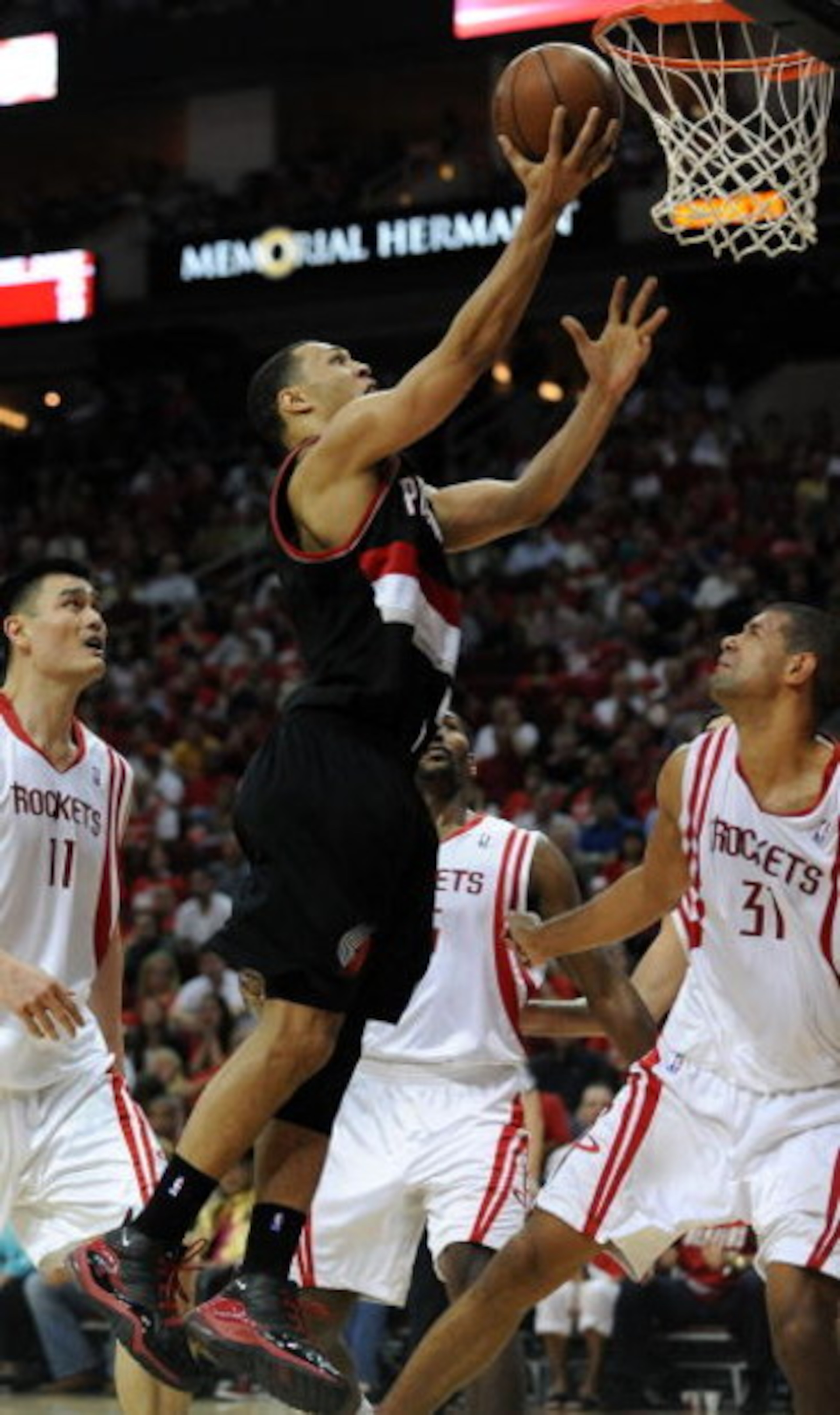 HOUSTON - APRIL 26:  Guard Brandon Roy #7 of the Portland Trail Blazers takes a shot against Shane Battier #31 of the Houston Rockets in Game Four of the Western Conference Quarterfinals during the 2009 NBA Playoffs at Toyota Center on April 26, 2009 in H