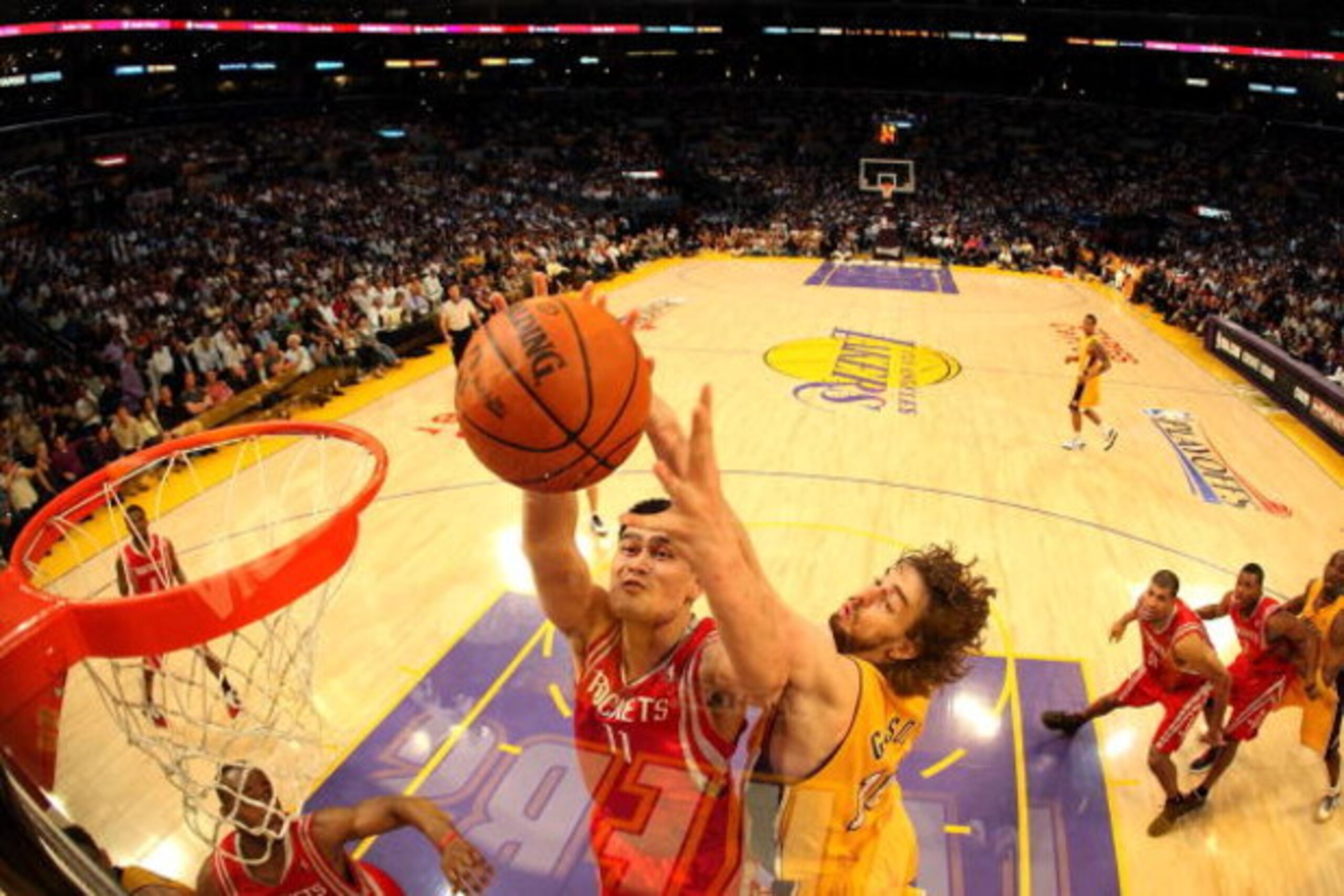 LOS ANGELES, CA - MAY 06:  Yao Ming #11 of the Houston Rockets and Pau Gasol #16 of the Los Angeles Lakers battle for the ball in the second half of Game Two of the Western Conference Semifinals during the 2009 NBA Playoffs at Staples Center on May 6, 200
