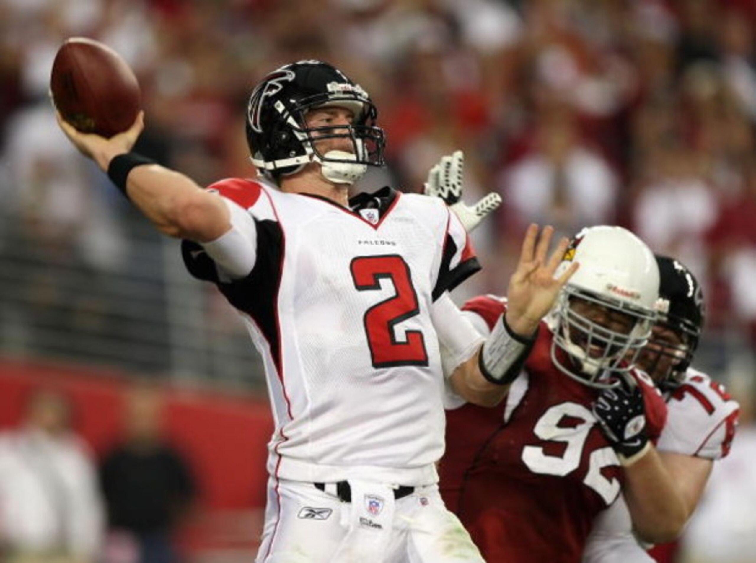 GLENDALE, AZ - JANUARY 03:  Quarterback Matt Ryan #2 of the Atlanta Falcons throws a pass under pressure from Bertrand Berry #92 of the Arizona Cardinals during the NFC Wild Card Game on January 3, 2009 at University of Phoenix Stadium in Glendale, Arizon