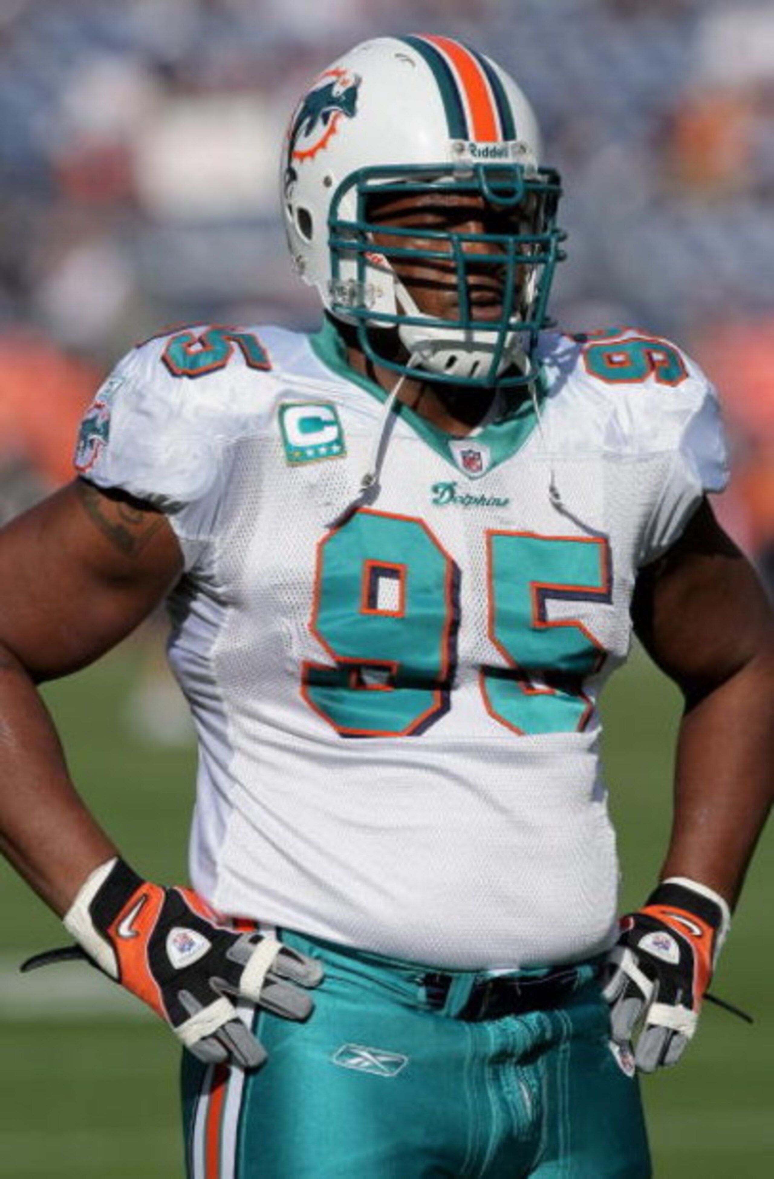 DENVER - NOVEMBER 02:  Defensive tackle Jason Ferguson #95 of the Miami Dolphins warms up prior to facing the Denver Broncos during NFL action at Invesco Field at Mile High on November 2, 2008 in Denver, Colorado. The Dolphins defeated the Broncos 26-17. 