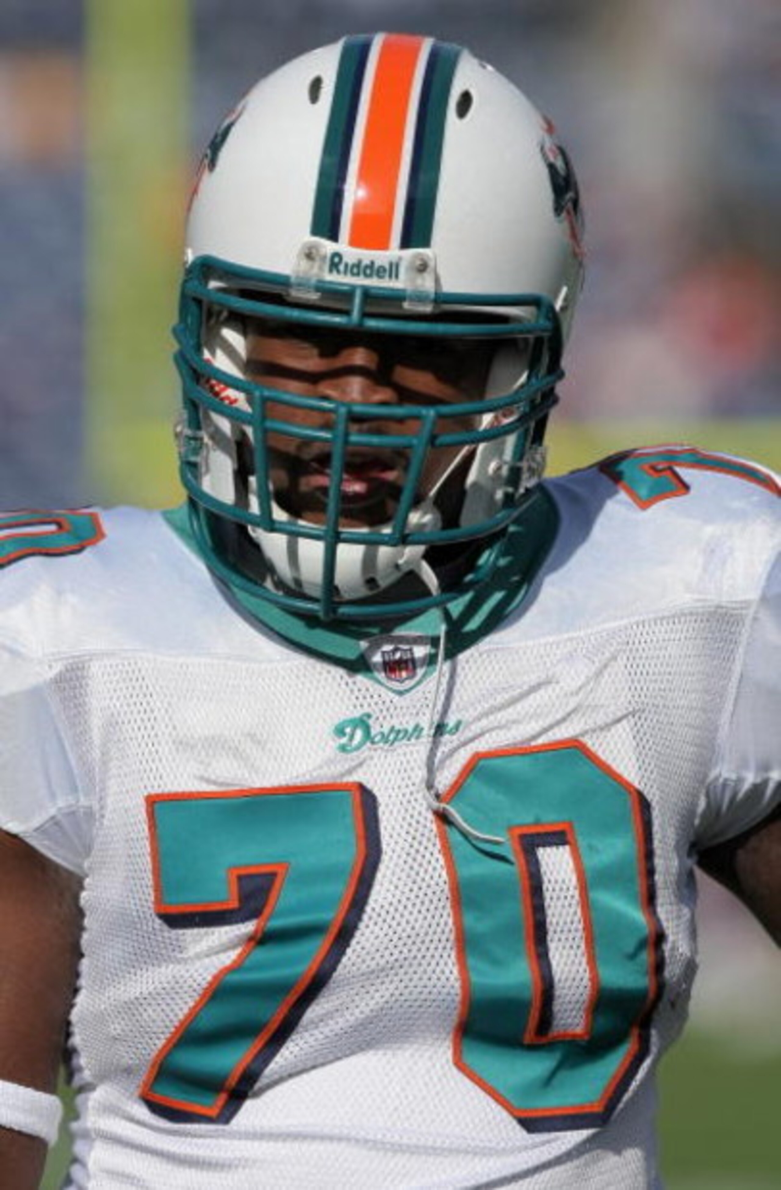 DENVER - NOVEMBER 02:  Defensive end Kendall Langford #70 of the Miami Dolphins warms up prior to facing the Denver Broncos during NFL action at Invesco Field at Mile High on November 2, 2008 in Denver, Colorado. The Dolphins defeated the Broncos 26-17.  