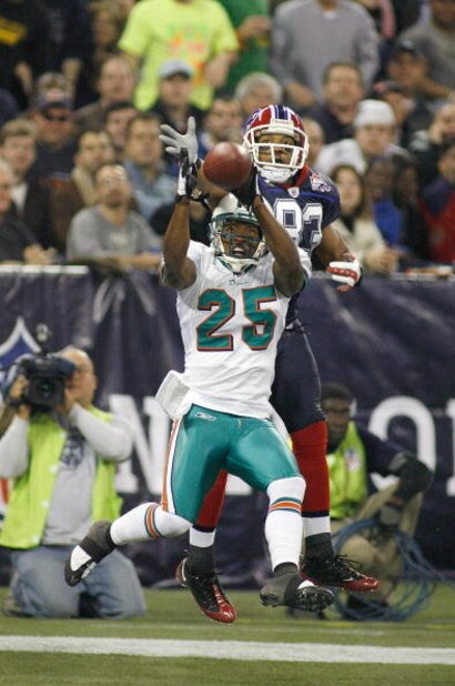 TORONTO, ON - DECEMBER 07: Will Allen #25 of the Miami Dolphins intercepts a pass in the end zone intended for Lee Evans #83 of the Buffalo Bills on December 7, 2008  at Rogers Centre in Toronto, Ontario, Canada. The Dolphins won 16-3.  (Photo by Rick Ste