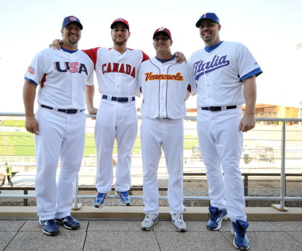 GLENDALE, AZ - FEBRUARY 21:  Jonathan Broxton #51, Russell Martin #55, Victor Garate #78 and Val Pascucci #71 of the Los Angeles Dodgers pose for a photo wearing their World Baseball team jerseys during photo day at Camelback Ranch on February 21, 2009 in