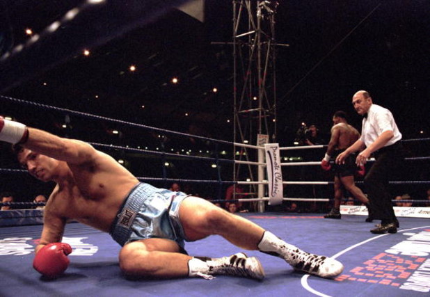 24 Jun 2000:  Lou Savarese attempts to get back to his feet during the heavyweight fight against Mike Tyson at Hampden Park in Glasgow, Scotland.  Mike Tyson won when the referee stopped the fight in the first round. \ Mandatory Credit: John Gichigi /Alls