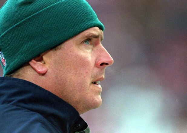 14 Nov 1999:  Dan Marino of the Miami Dolphins looks on from the sidelines as he is injured during the game against the Buffalo Bills at the Ralph Wilson Stadium in Orchard Park, New York. The Bills defeated the Dolphins 23-3. Mandatory Credit: Rick Stewa