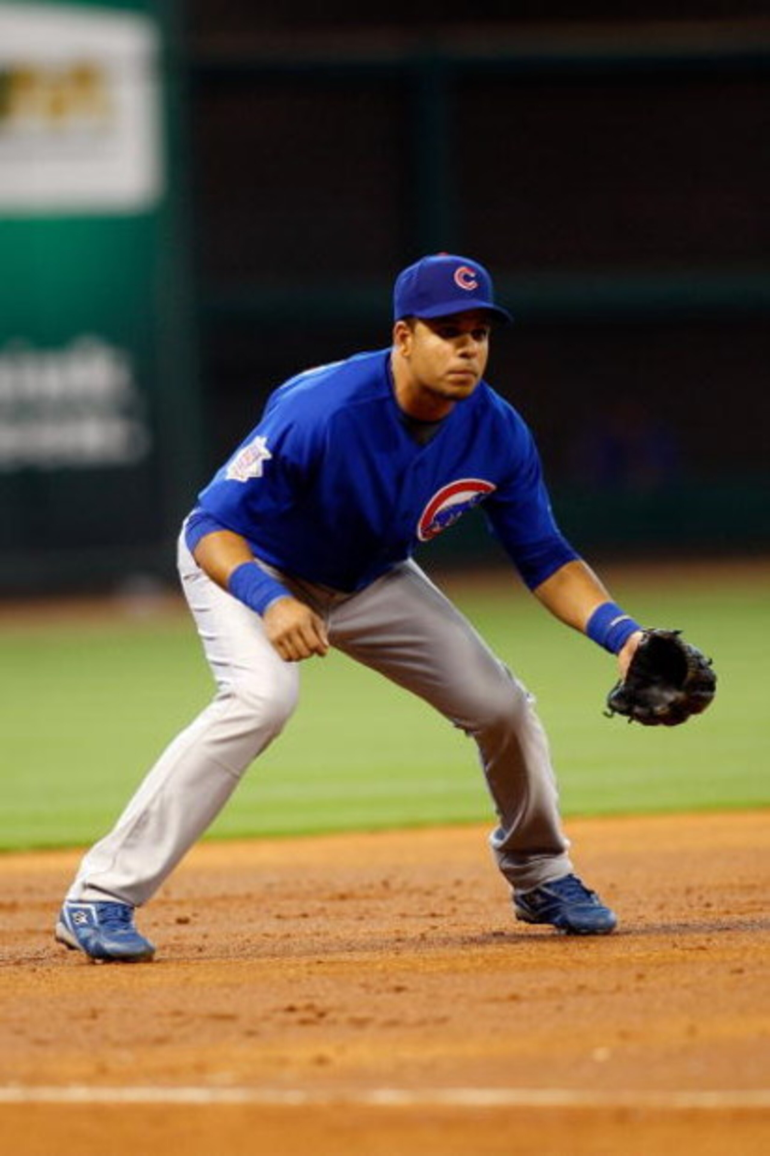 HOUSTON - APRIL 06:  Aramis Ramirez #16 of the Chicago Cubs fields against the Houston Astros during the Opening Day game on April 6, 2009 at Minute Maid Park in Houston, Texas.  (Photo by Chris Graythen/Getty Images)