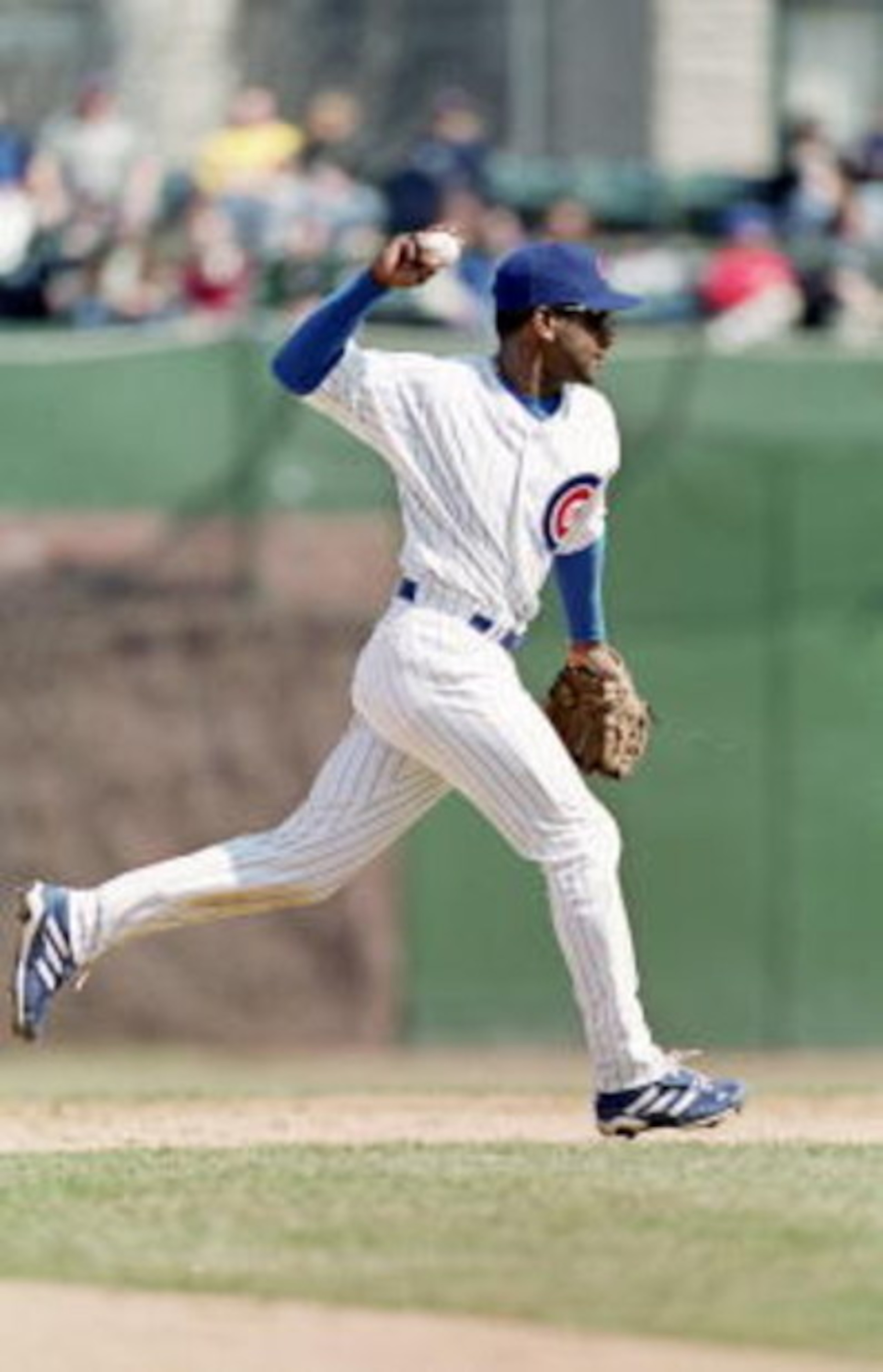 2 Apr 2001:  Ricky Gutierrez #12 of the Chicago Cubs throws the ball during the game against the Montreal Expos at Wrigley Field in Chicago, Illinois.  The Expos defeated the Cubs 5-4.Mandatory Credit: Jonathan Daniel  /Allsport