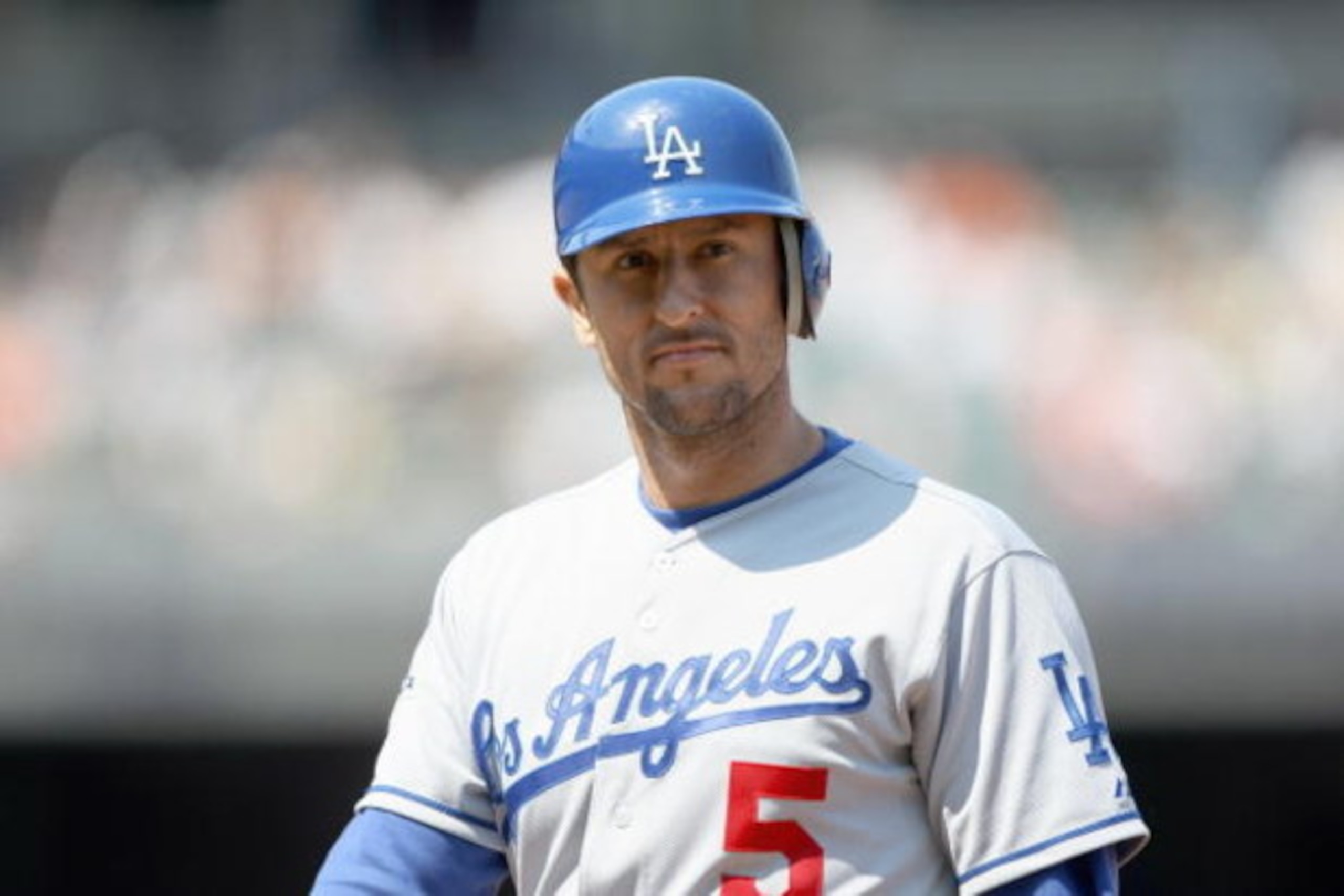 SAN FRANCISCO - JULY 6:  Nomar Garciaparra #5 of the Los Angeles Dodgers walks on the field against of the San Francisco Giants during a Major League Baseball game at AT&T Park on July 6, 2008 in San Francisco, California. ( Photo by: Jed Jacobsohn/Getty 