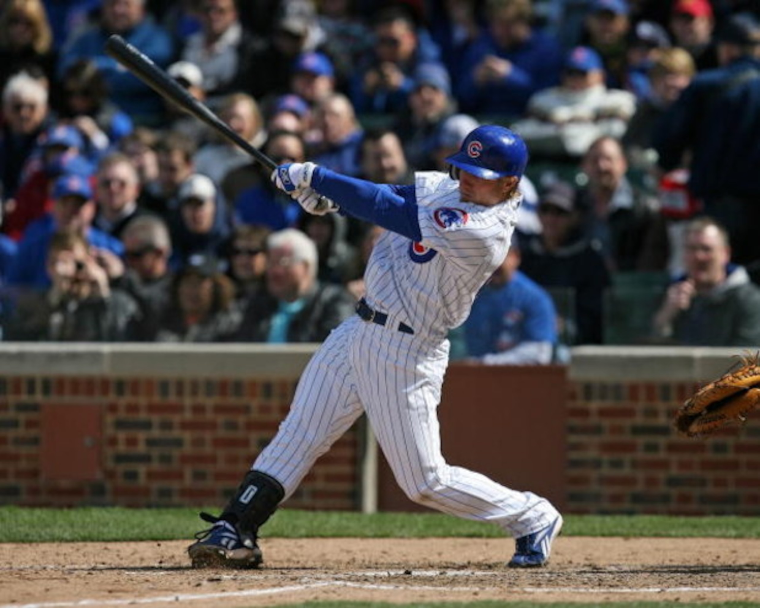 CHICAGO - APRIL 15: Mike Fontenot of the Chicago Cubs, wearing a #42 jersey on Jackie Robinson Day, hits against the Colorado Rockies on April 15, 2009 at Wrigley Field in Chicago, Illinois. The Rockies defeated the Cubs 5-2. (Photo by Jonathan Daniel/Get