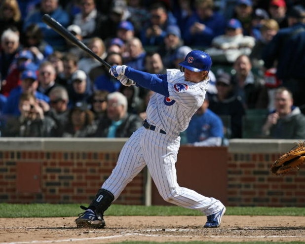 CHICAGO - APRIL 15: Mike Fontenot of the Chicago Cubs, wearing a #42 jersey on Jackie Robinson Day, hits against the Colorado Rockies on April 15, 2009 at Wrigley Field in Chicago, Illinois. The Rockies defeated the Cubs 5-2. (Photo by Jonathan Daniel/Get