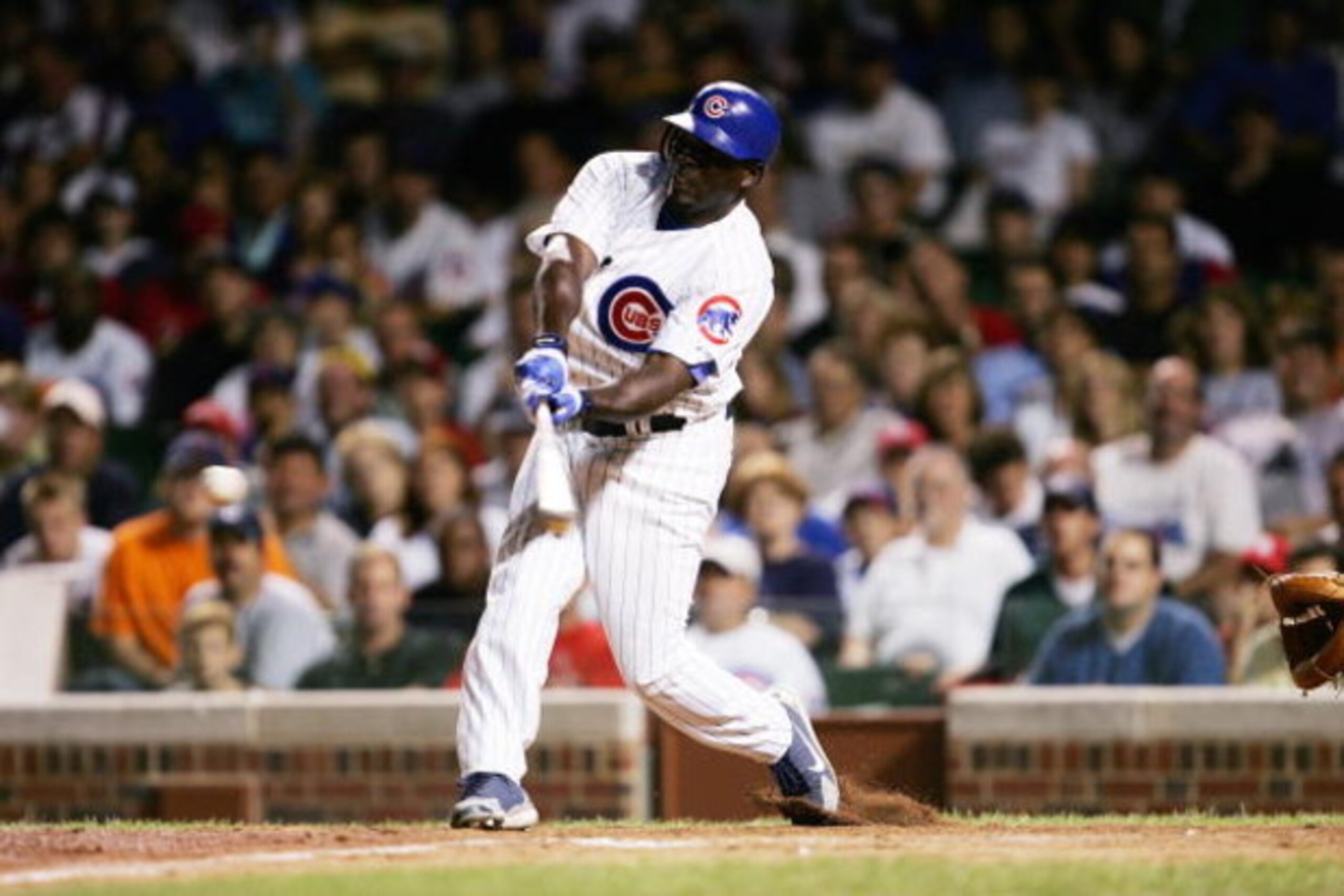 CHICAGO - AUGUST 14:  Outfielder Matt Lawton #50 of the Chicago Cubs attempts to hit against the St. Louis Cardinals on August 14, 2005 at Wrigley Field in Chicago, Illinois. The Cubs defeated the Cardinals 5-4. (Photo by Jonathan Daniel/Getty Images)