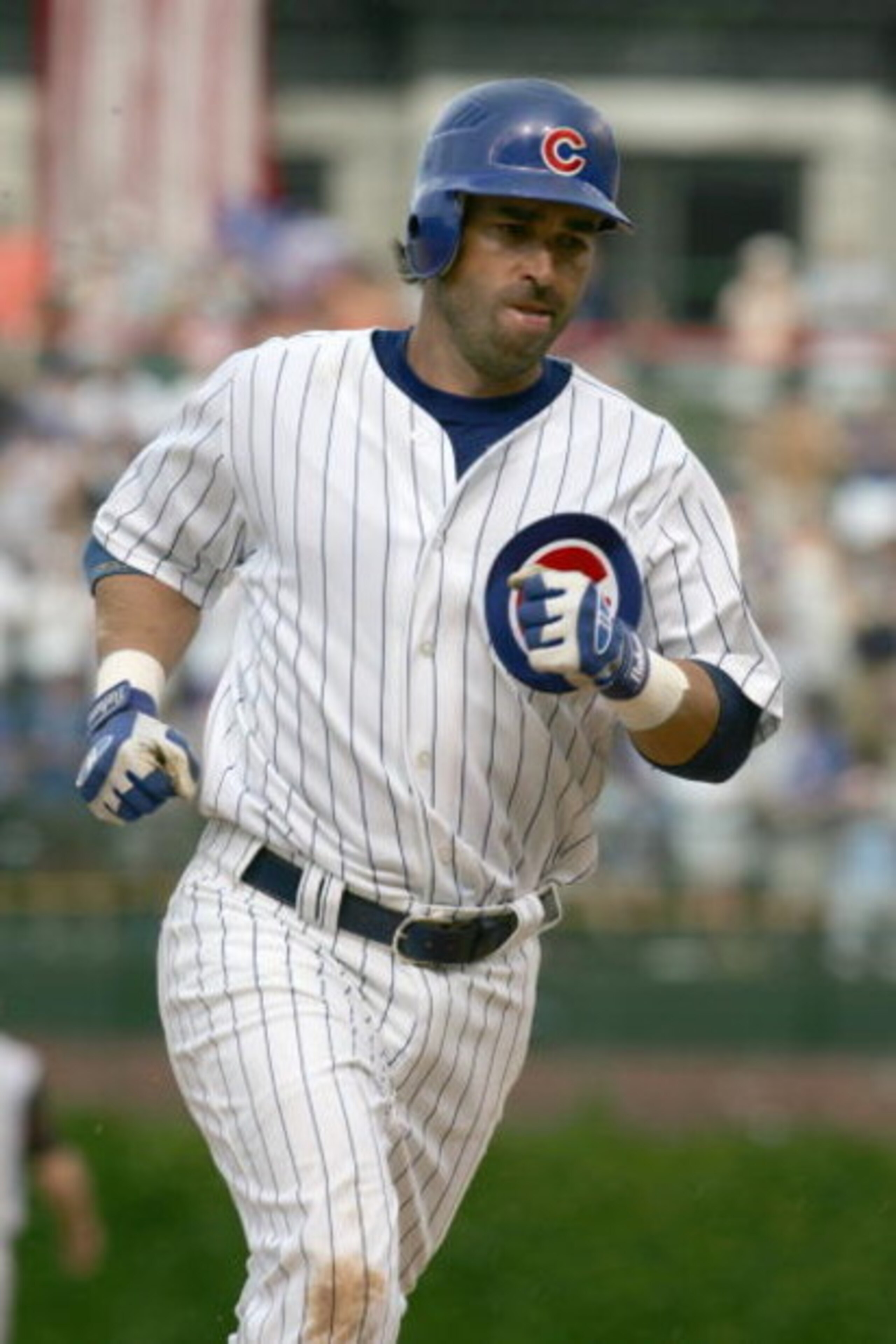 CHICAGO - MAY 29:  Todd Walker #7  of the Chicago Cubs runs the bases duirng the game against the Cincinnati Reds on May 29, 2006 at Wrigley Field in Chicago, Illinois. The Cubs defeated the Reds 7-3. (Photo by Jonathan Daniel/Getty Images) 