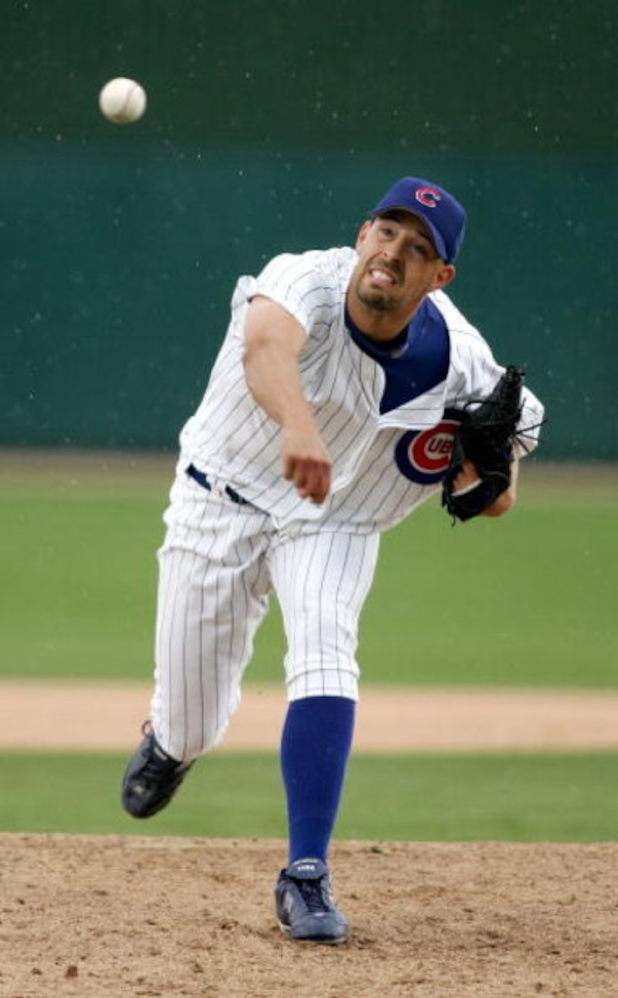MESA, AZ - MARCH 21:  David Aardsma #54 the Chicago Cubs pitches against the Milwaukee Brewers during a Spring Training Cactus League game on March 21, 2006 at Hohokam Stadium in Mesa, Arizona. The rain shortened game ended in the sixth inning in a 4-4 ti