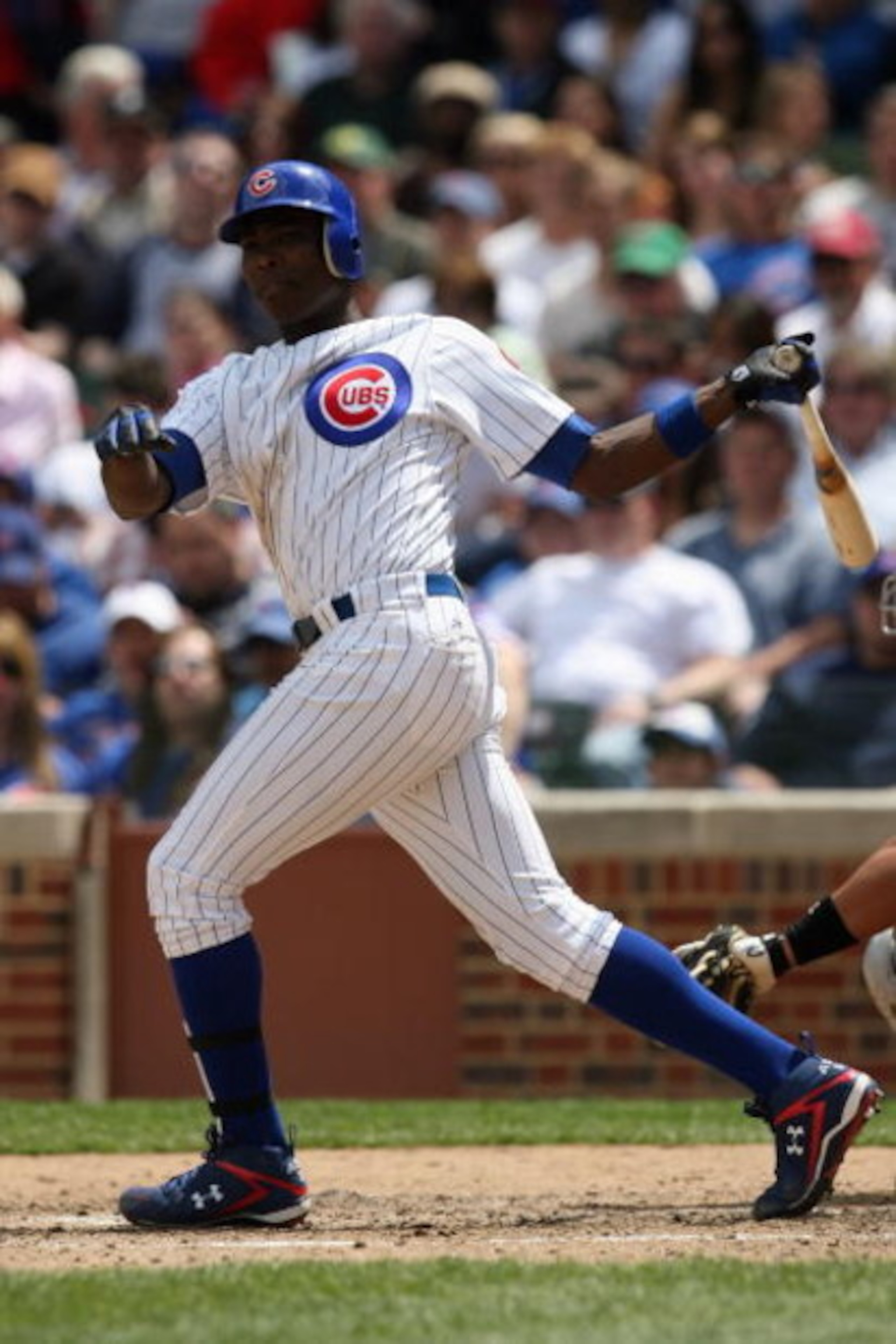 CHICAGO - MAY 2:  Alfonso Soriano #12 of the Chicago Cubs runs to first against the Florida Marlins during the game on May 2, 2009 at Wrigley Field in Chicago, Illinois. (Photo by Jonathan Daniel/Getty Images) 