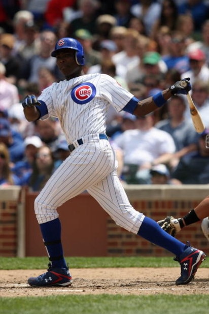 CHICAGO - MAY 2:  Alfonso Soriano #12 of the Chicago Cubs runs to first against the Florida Marlins during the game on May 2, 2009 at Wrigley Field in Chicago, Illinois. (Photo by Jonathan Daniel/Getty Images) 