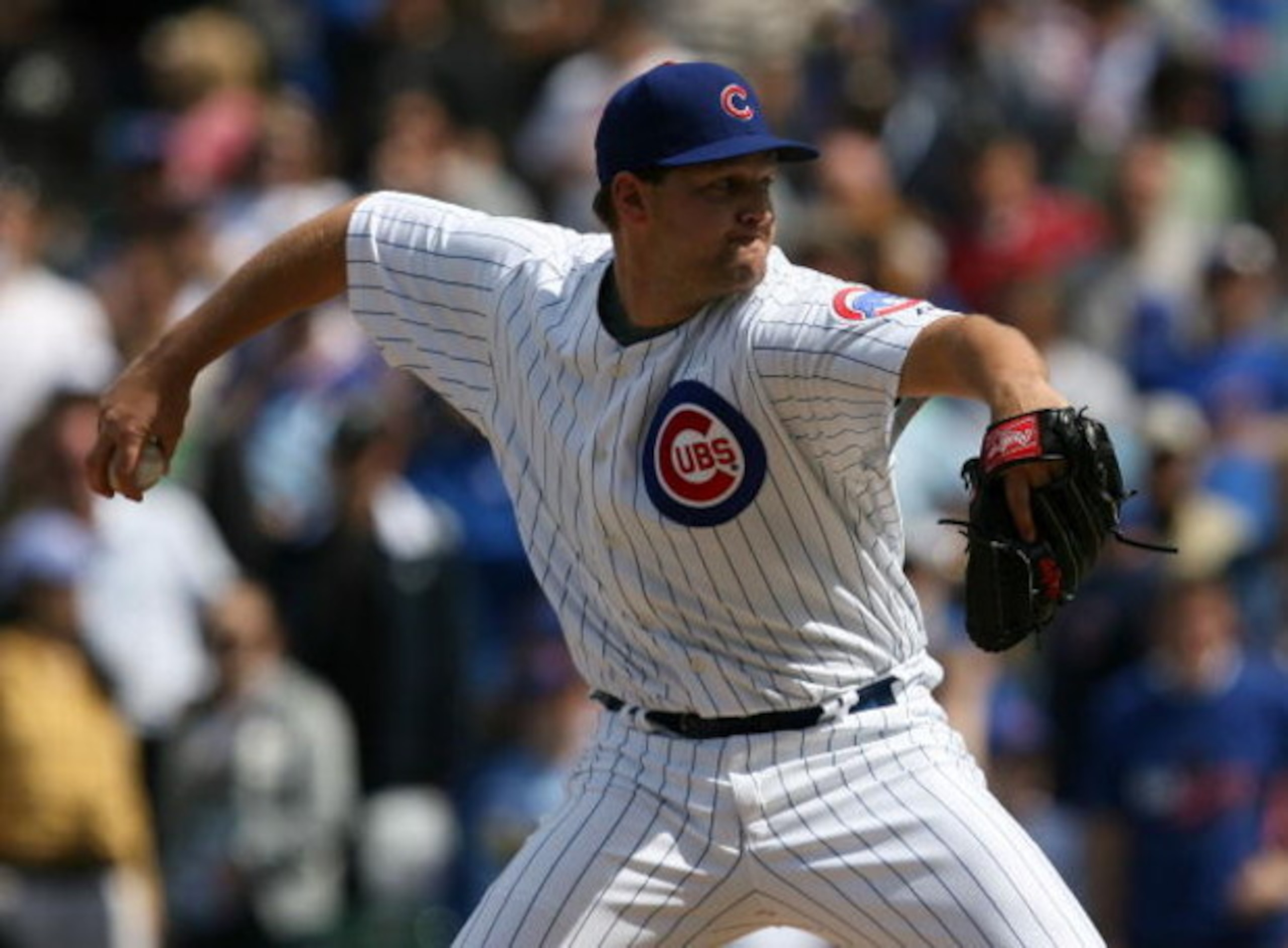 CHICAGO - MAY 02: Aaron Heilman #47 of the Chicago Cubs finishes off the Florida Marlins in the 9th inning on May 2, 2009 at Wrigley Field in Chicago, Illinois. The Cubs defeated the Marlins 6-1. (Photo by Jonathan Daniel/Getty Images)