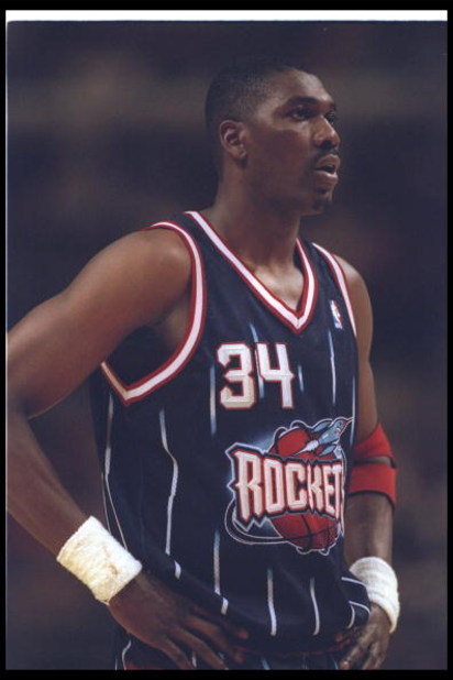 3 Jan 1996:  Center Hakeem Olajuwon of the Houston Rockets looks on during a game against the Chicago Bulls at the United Center in Chicago, Illinois.  The Bulls won the game, 100-86. Mandatory Credit: Stephen Dunn  /Allsport Mandatory Credit: Stephen Dun