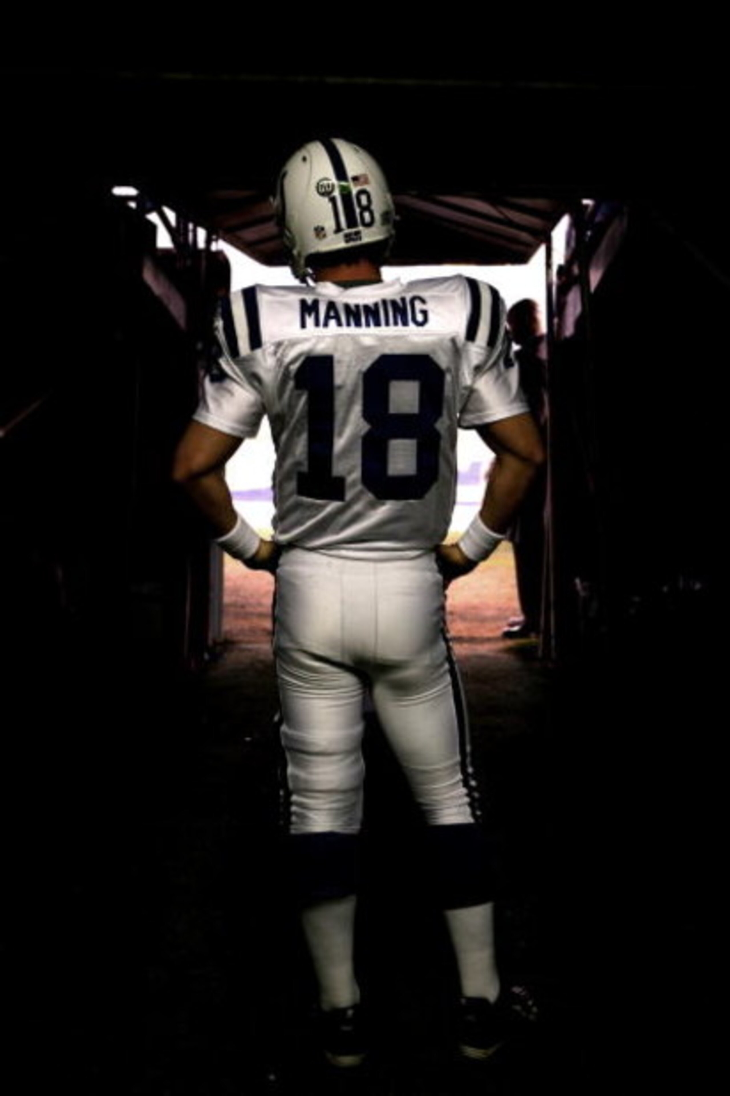 SAN DIEGO, CA - NOVEMBER 23:   Quarterback Peyton Manning #18 of the Indianapolis Colts prepares to enter the game against the San Diego Chargers during their NFL Game at Qualcomm Stadium on November 23, 2008 in San Diego, California. (Photo by Donald Mir