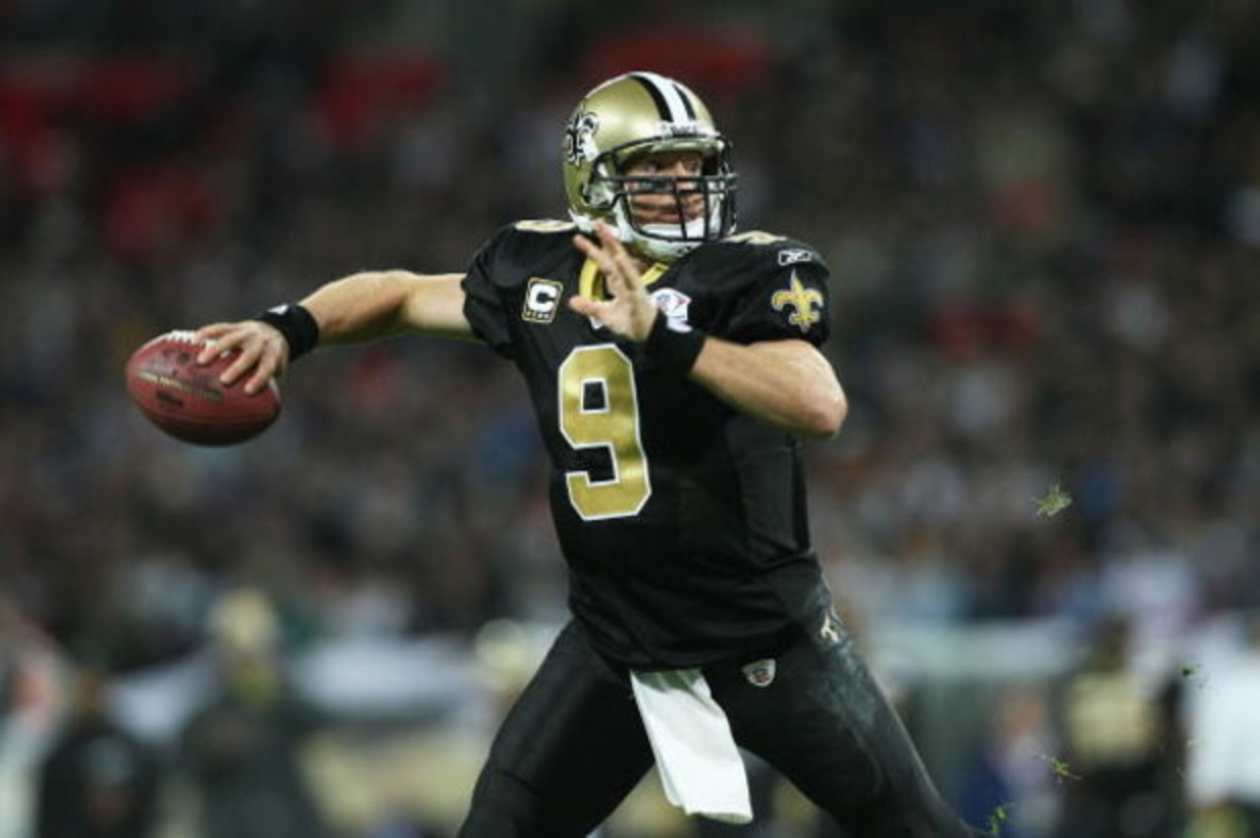 LONDON - OCTOBER 26: Drew Brees of the New Orleans Saints throws the ball during the Bridgestone International Series NFL match between San Diego Chargers and New Orleans Saints at Wembley Stadium on October 26, 2008 in London, England.  (Photo by Nick La