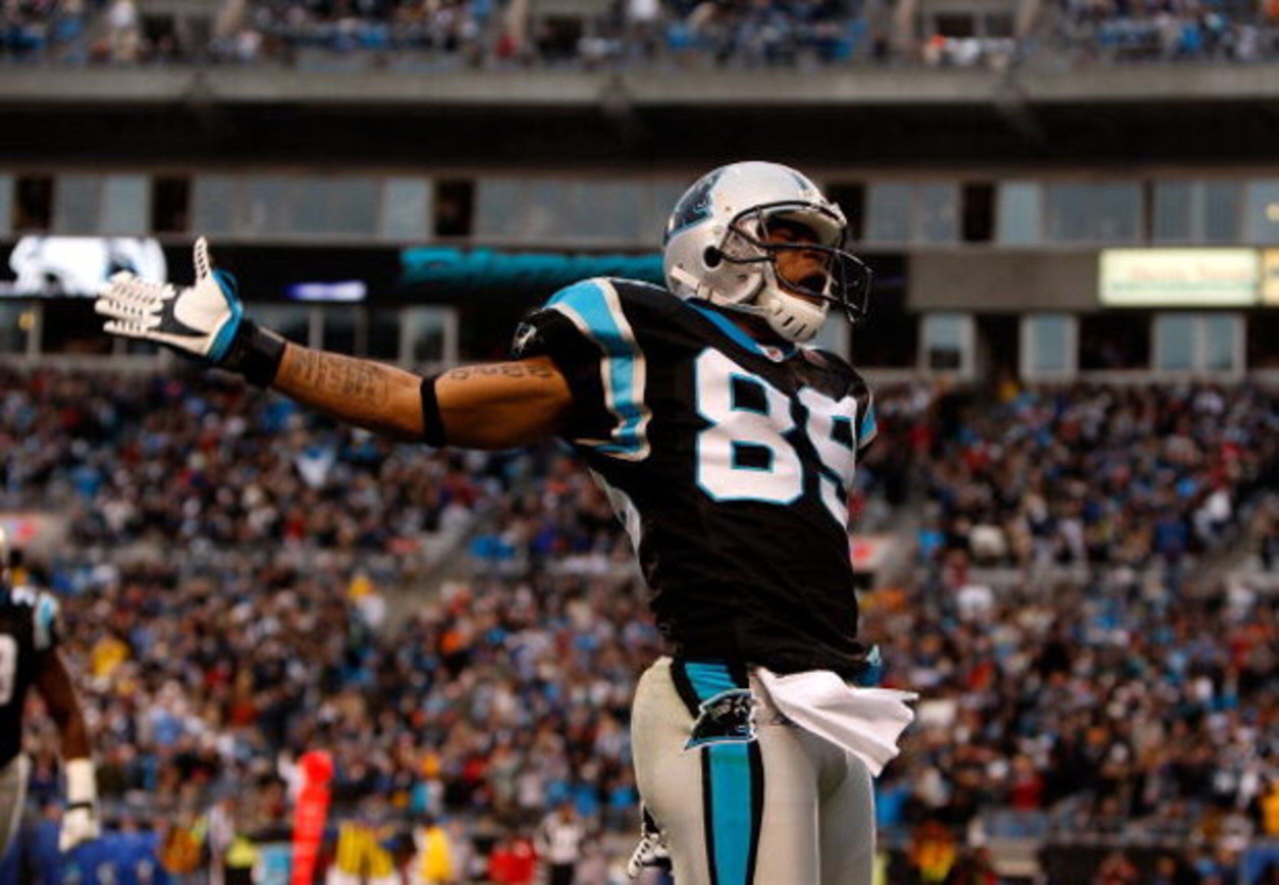 CHARLOTTE, NC - DECEMBER 14:  Steve Smith #89 of the Carolina Panthers celebrates after scoring a touchdown against the Denver Broncos at Bank of America Stadium on December 14, 2008 in Charlotte, North Carolina  (Photo by Streeter Lecka/Getty Images)