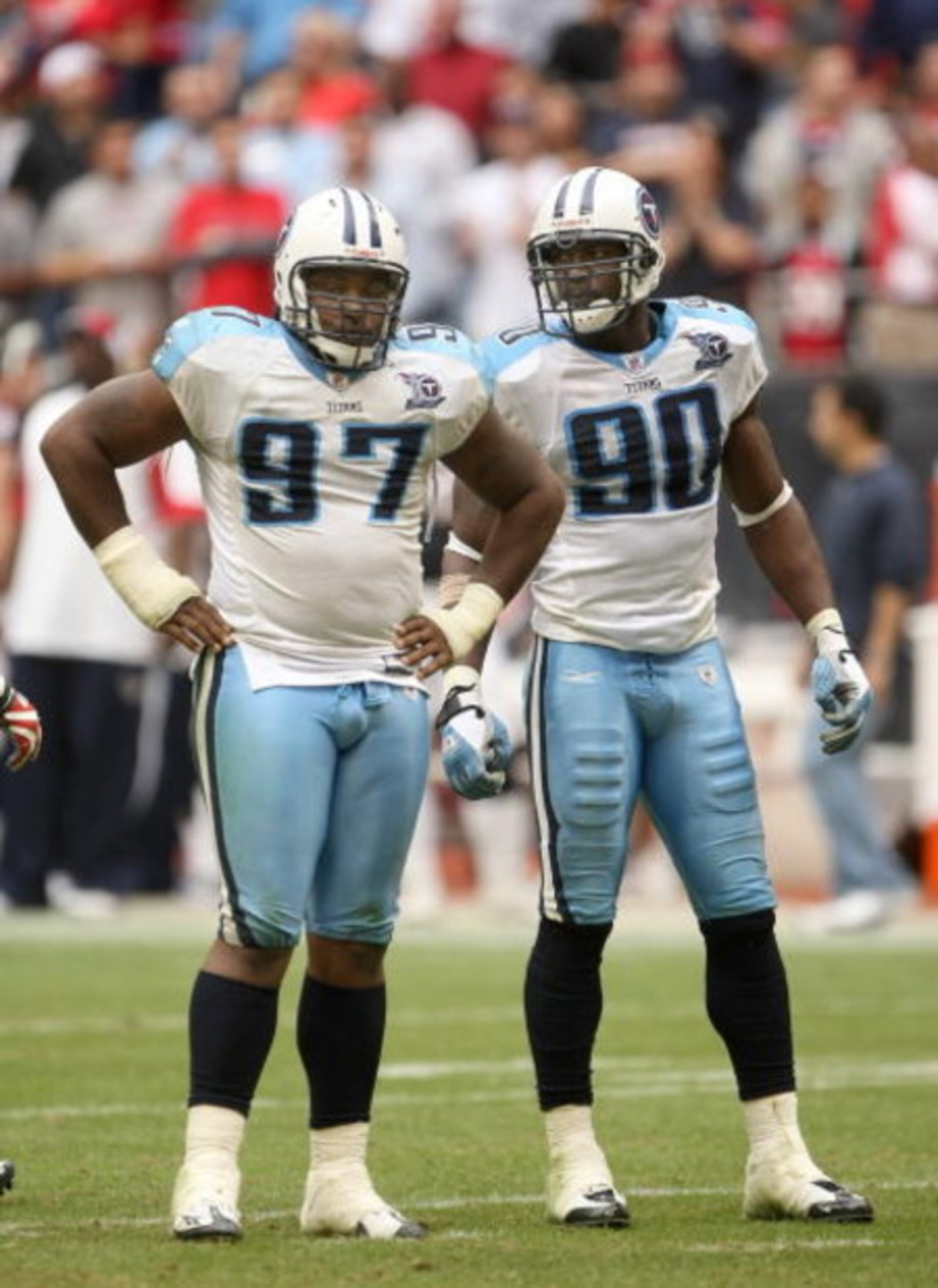 HOUSTON - DECEMBER 14:  Defensive linemen Tony Brown #97 and Jevon Kearse #90 of the Tennessee Titans stand on the line during the game with the Houston Texans on December 14, 2008 at Reliant Stadium in Houston, Texas.  The Texans won 13-12.  (Photo by St
