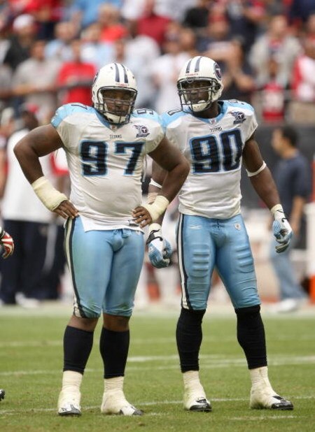 HOUSTON - DECEMBER 14:  Defensive linemen Tony Brown #97 and Jevon Kearse #90 of the Tennessee Titans stand on the line during the game with the Houston Texans on December 14, 2008 at Reliant Stadium in Houston, Texas.  The Texans won 13-12.  (Photo by St